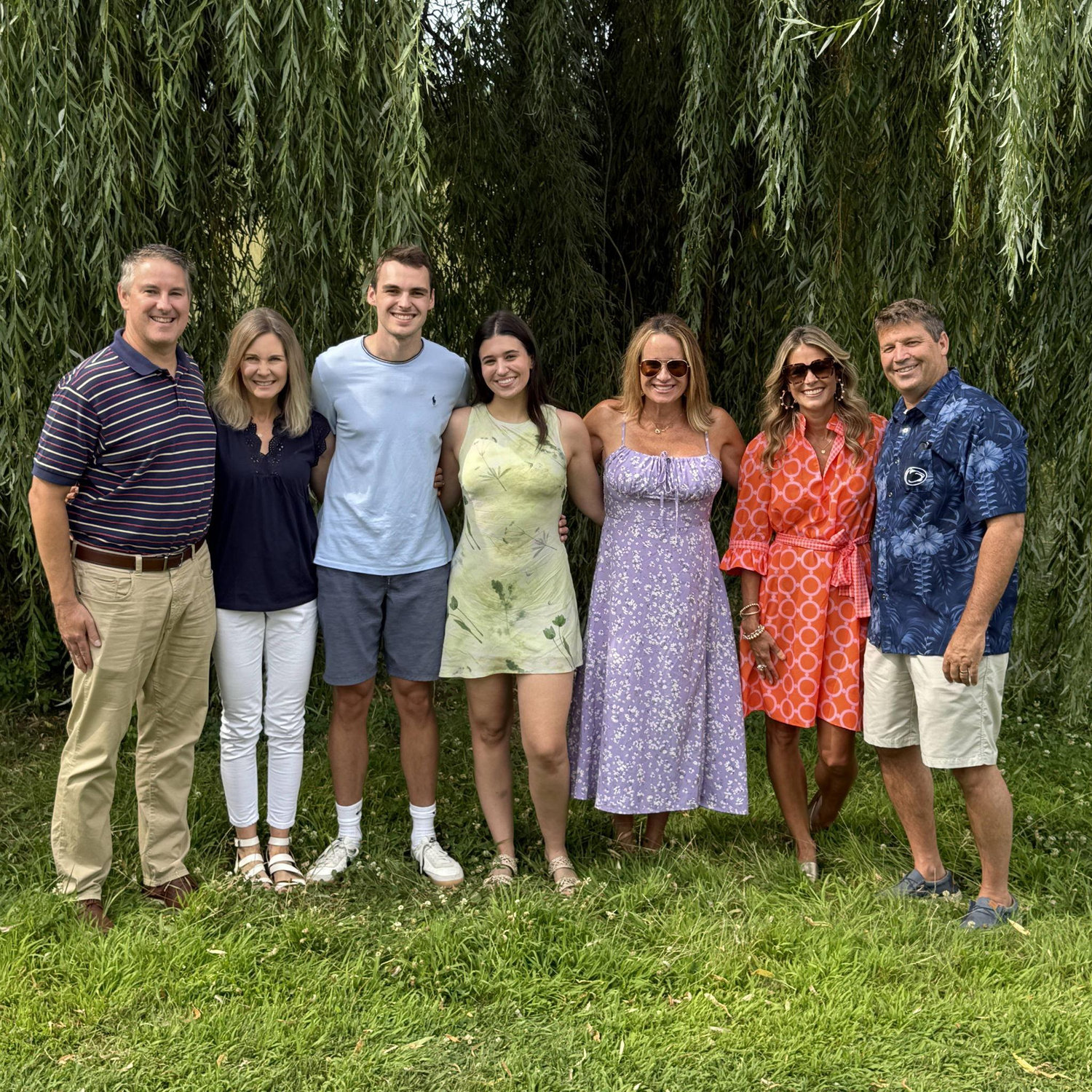 With our parents under the willow tree where Kyle proposed