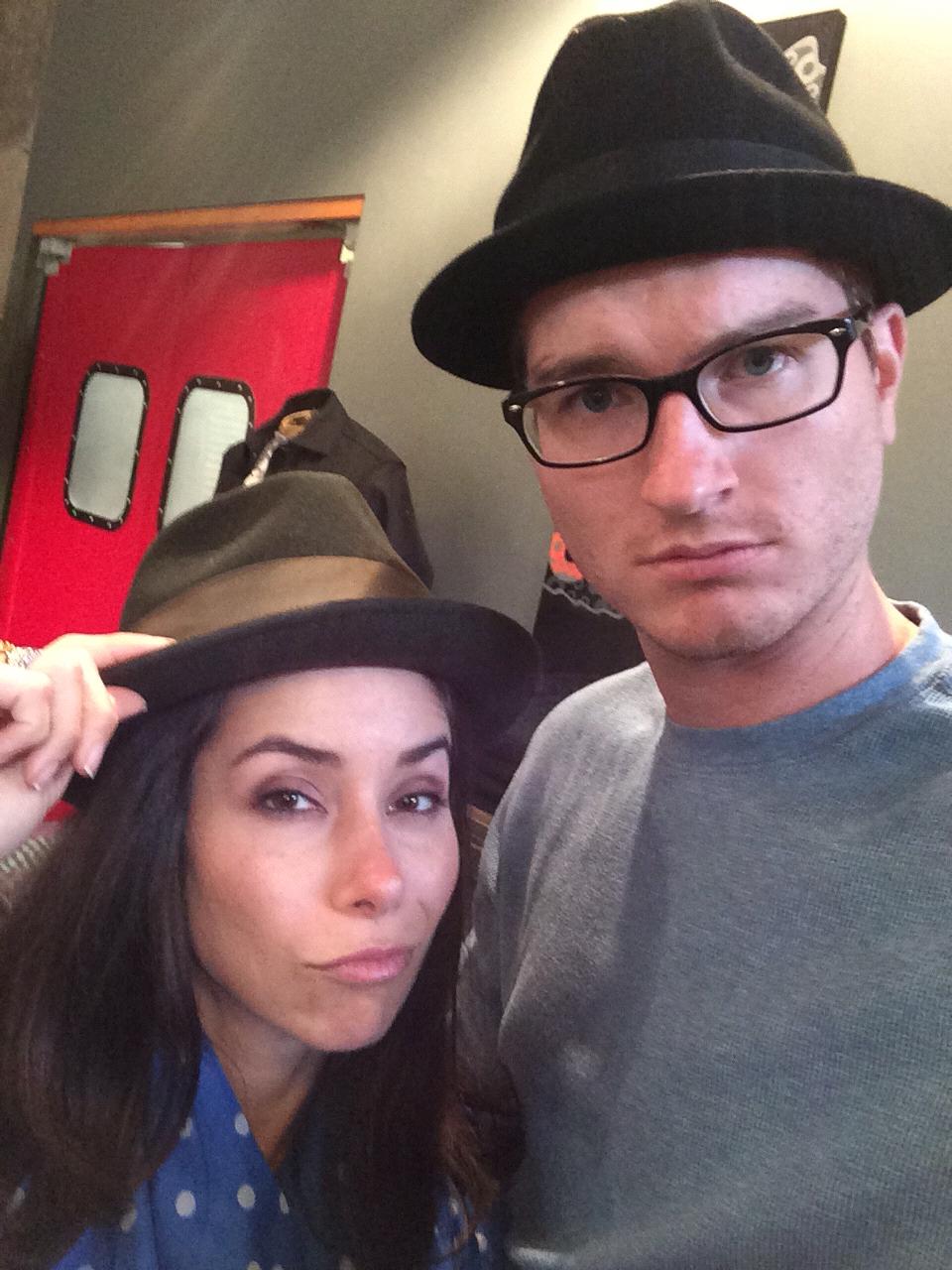 Trying on dumb hats