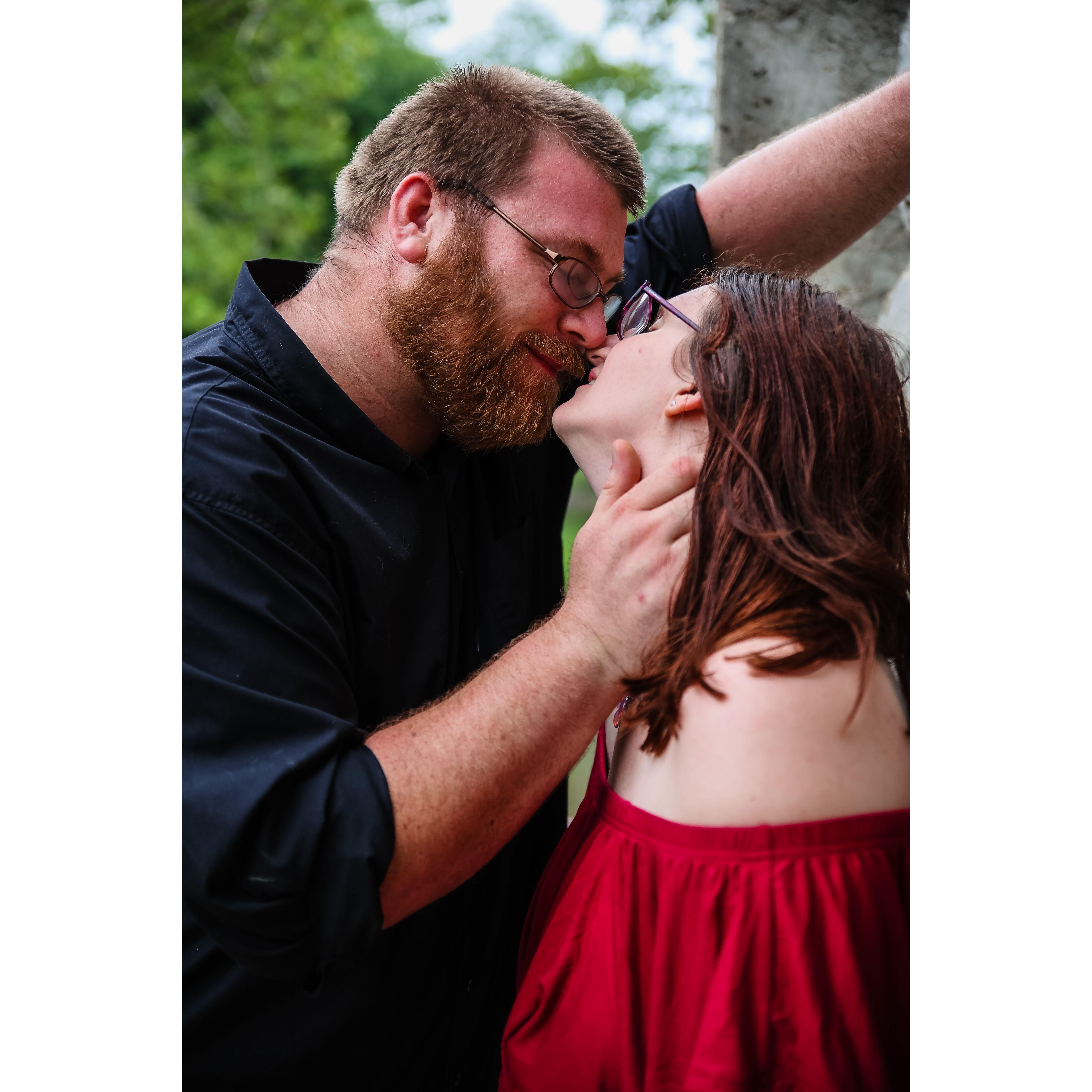 One of my favorite photos of us. Photo credit to Through a Lense Photography who took our family and maternity photos