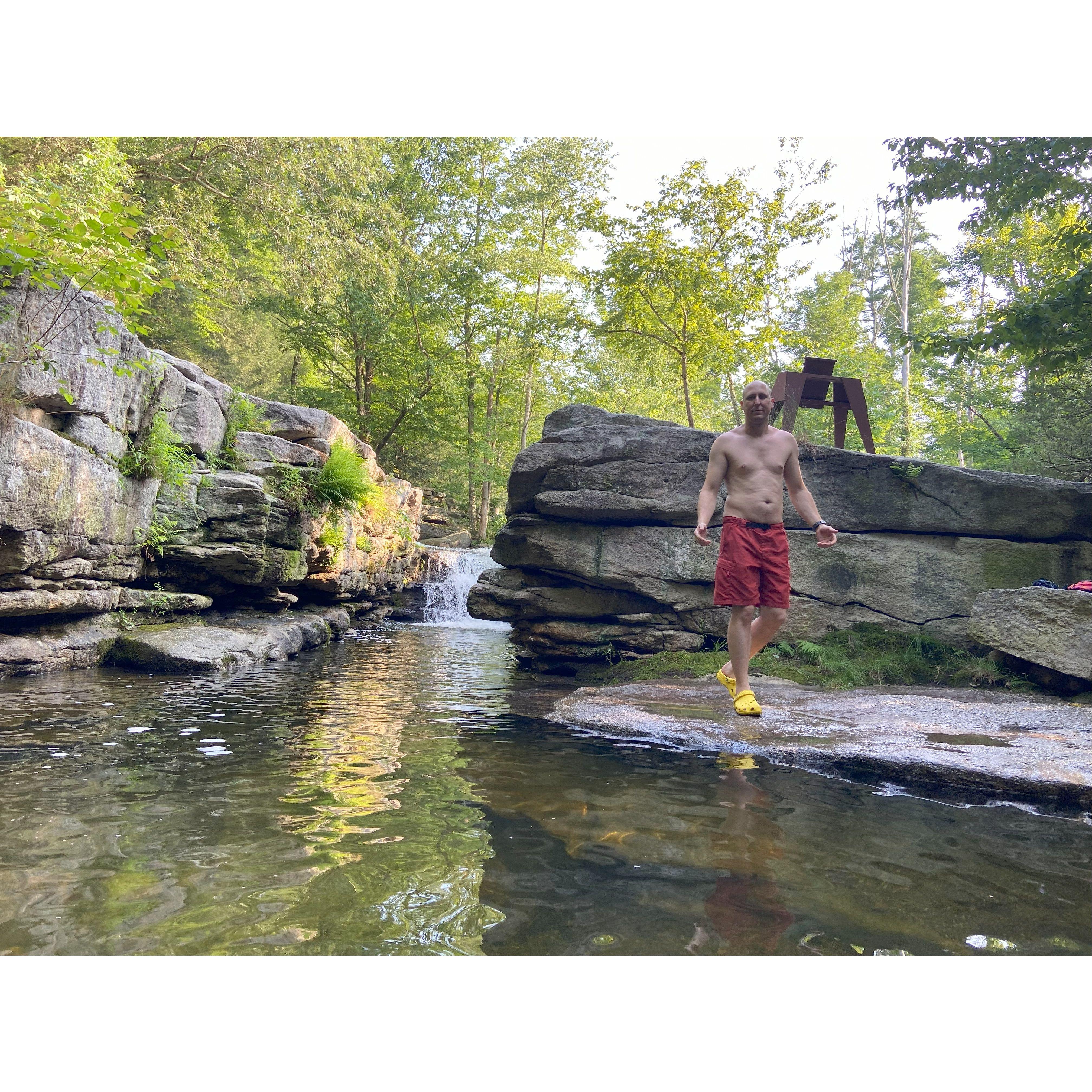 After a long day of climbing in the heat we came upon an old sawmill operated by the water flowing through this rock cut. Careful of the copperheads in the crack. Only at The Gunks!