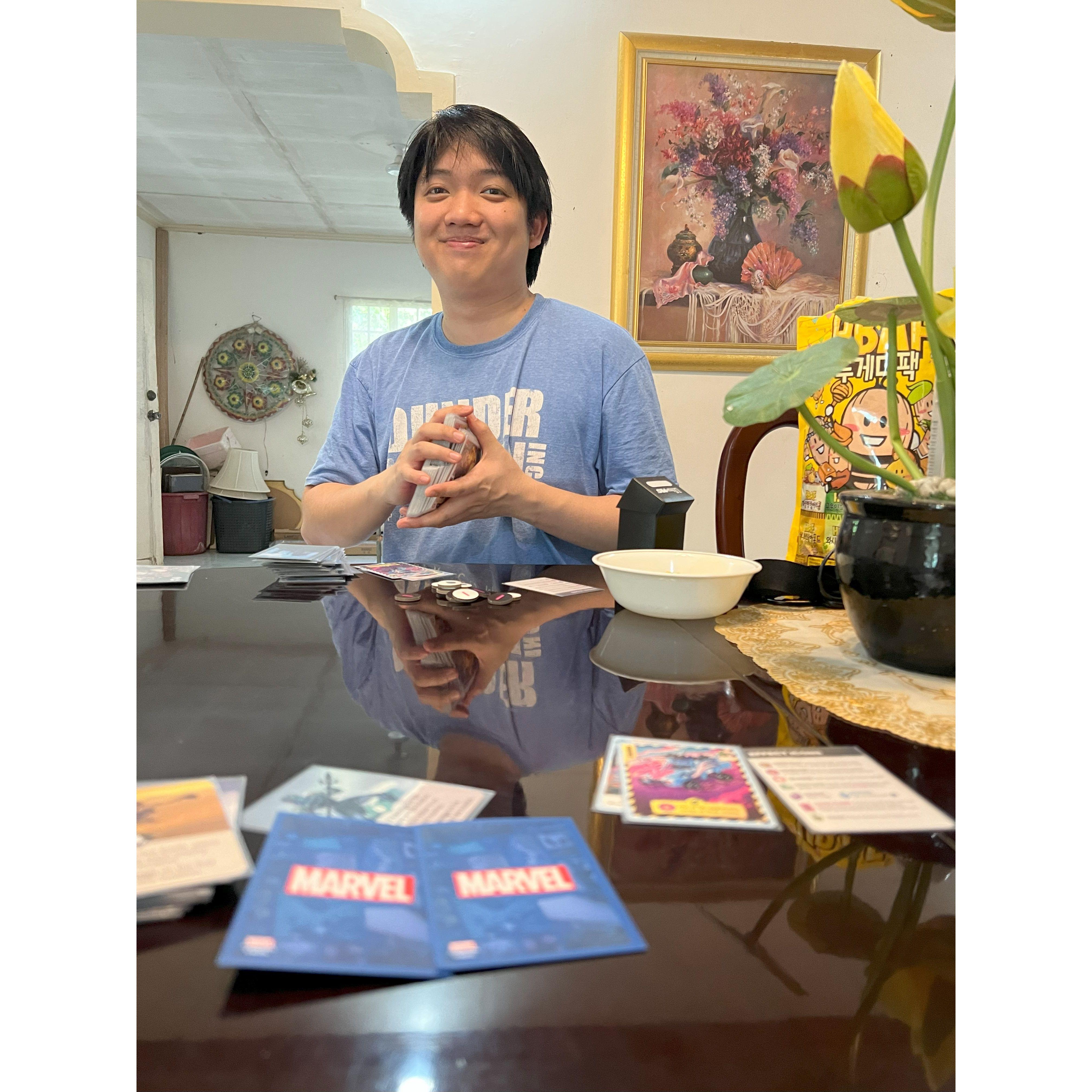 He's the happiest when they're playing board/card games