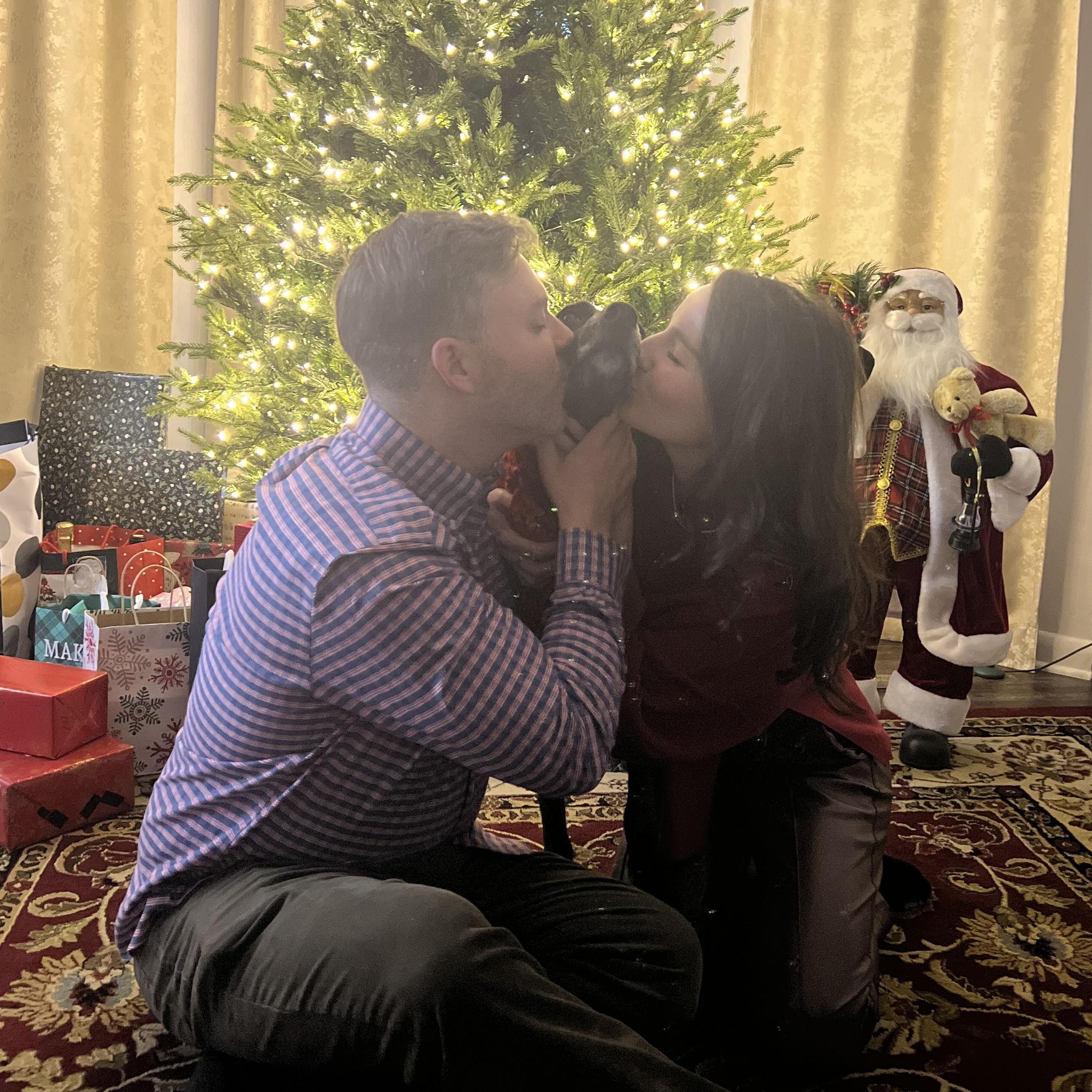 We both kissed Lilah under the Christmas tree and felt the holiday magic.