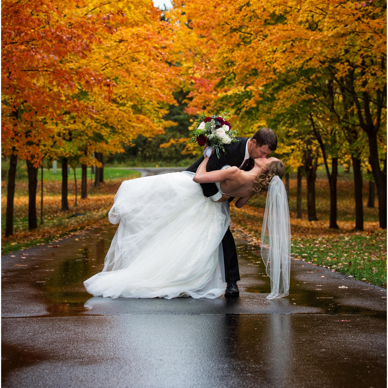 Wedding photos were taken at Tiffany's parent's house after the ceremony. The fall colors couldn't have been more perfect!