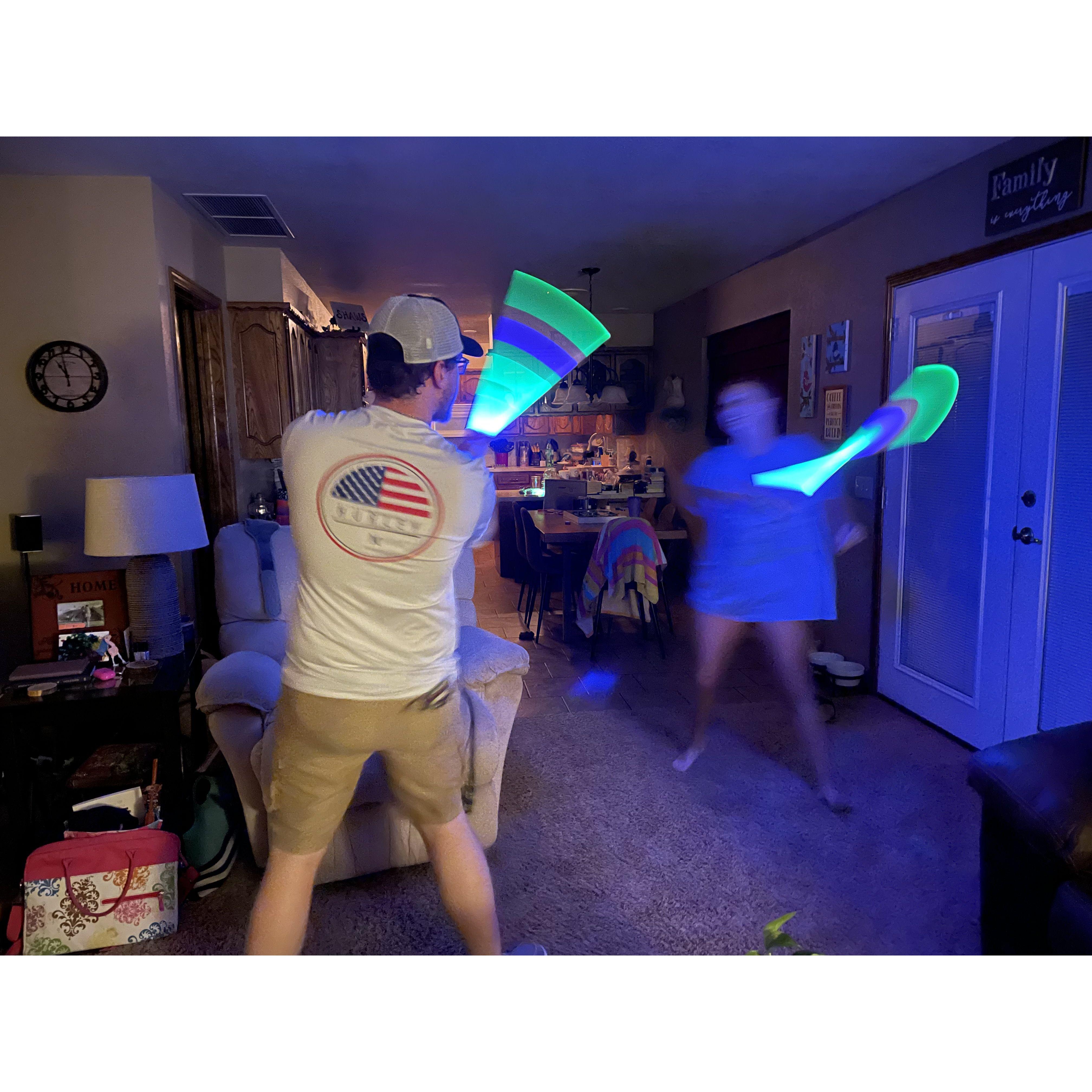 An intense lightsaber dual brought to you by $1 fourth of July lightsabers. (July 2022)