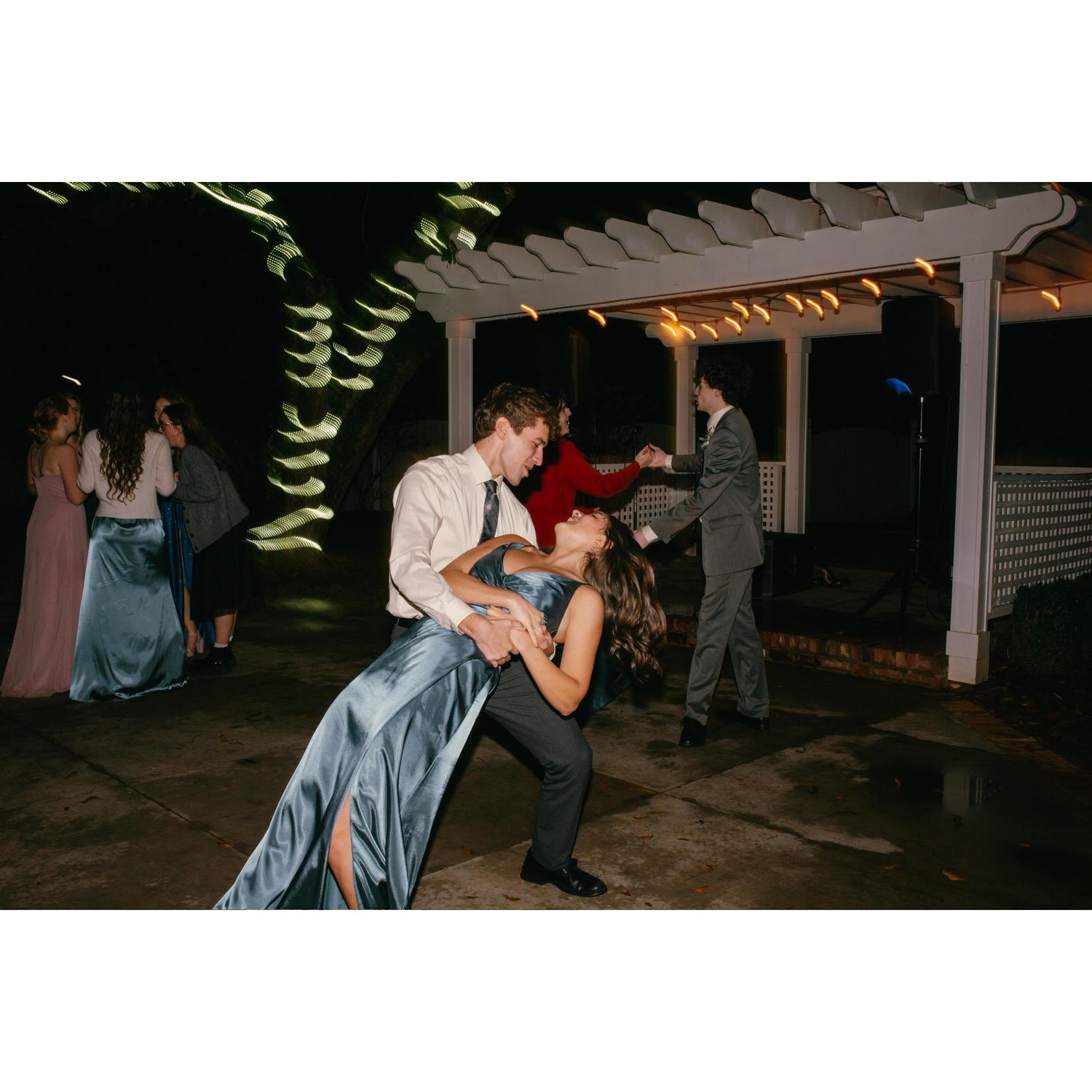 At our mutual "connection's" wedding (we're talking about you Anna). Doing something we both love, dancing together!