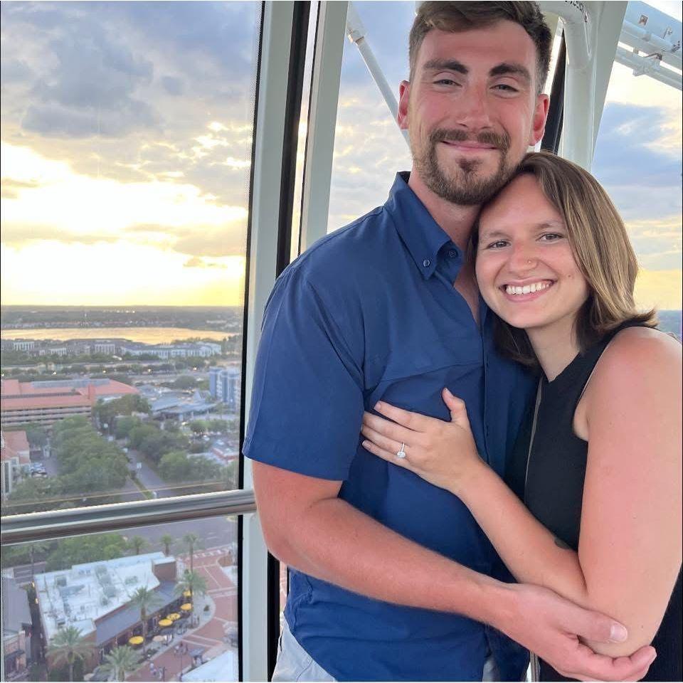 We got engaged on the Ferris wheel at ICON Park in Orlando, FL.