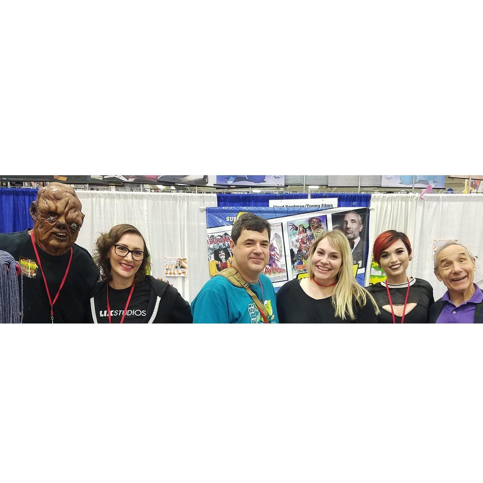 Erin's first comic convention - Super Con in Louisville in 2018. Definitely not Eric's first con! Eric was excited to meet Troma Entertainment founder, Lloyd Kaufman.