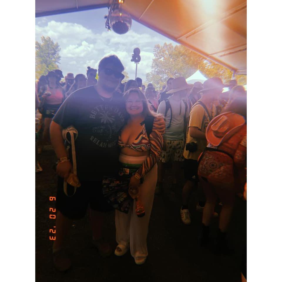 A stranger during a set at Bonnaroo offered to take our photo since we looked so cute together