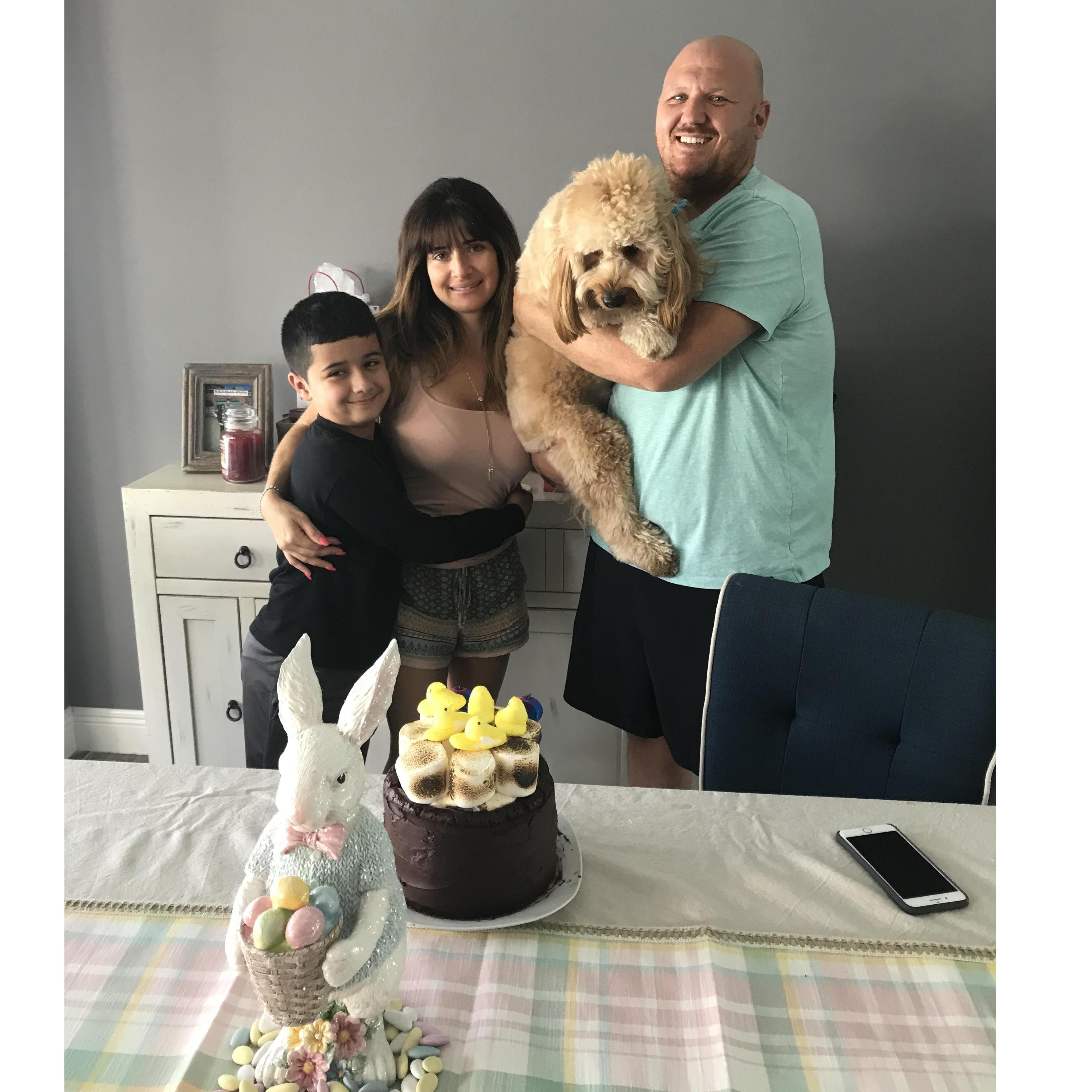 Our little family celebrating a birthday. 👦🏻🐶