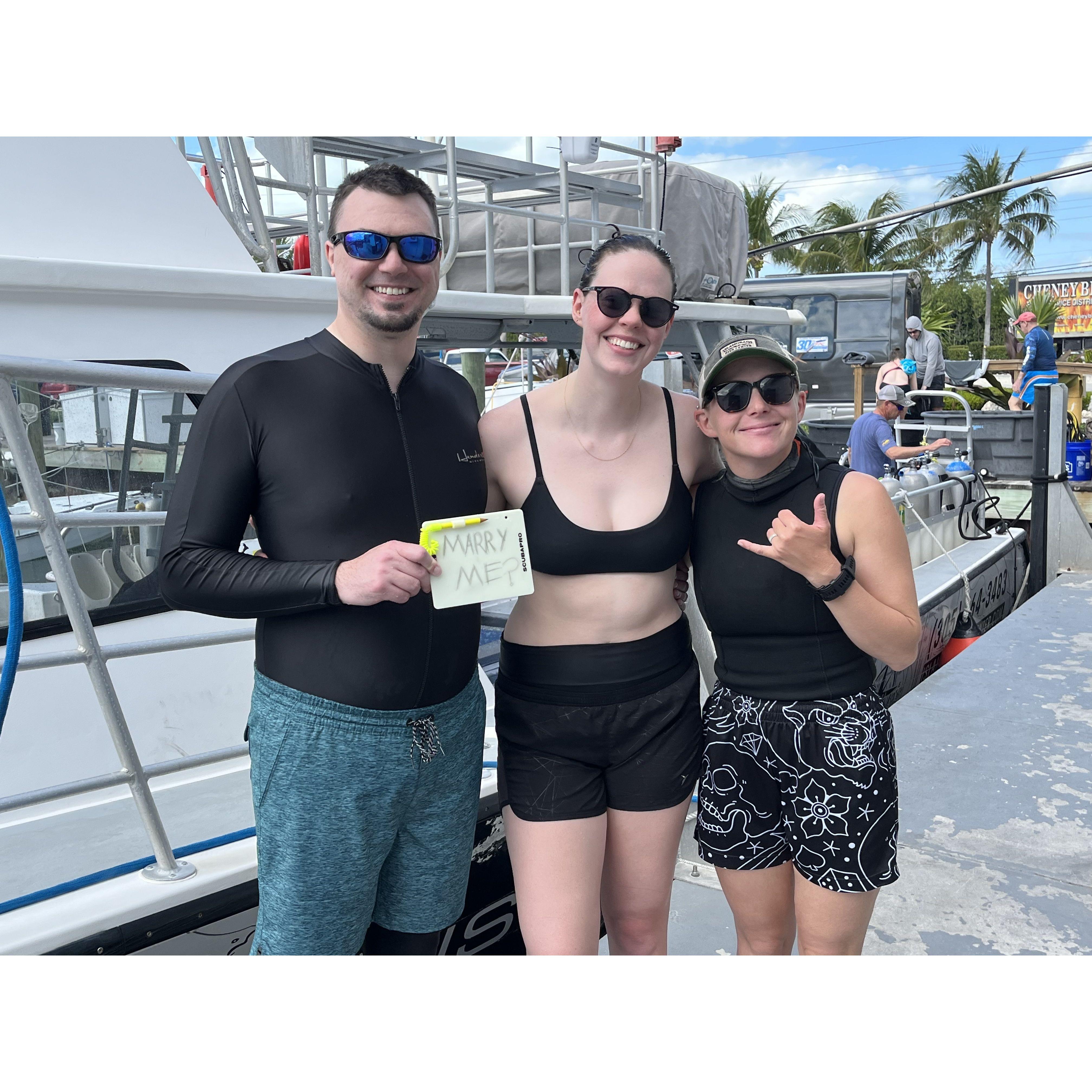Posing with our dive leader after Ben proposed! Florida Keys, 2023