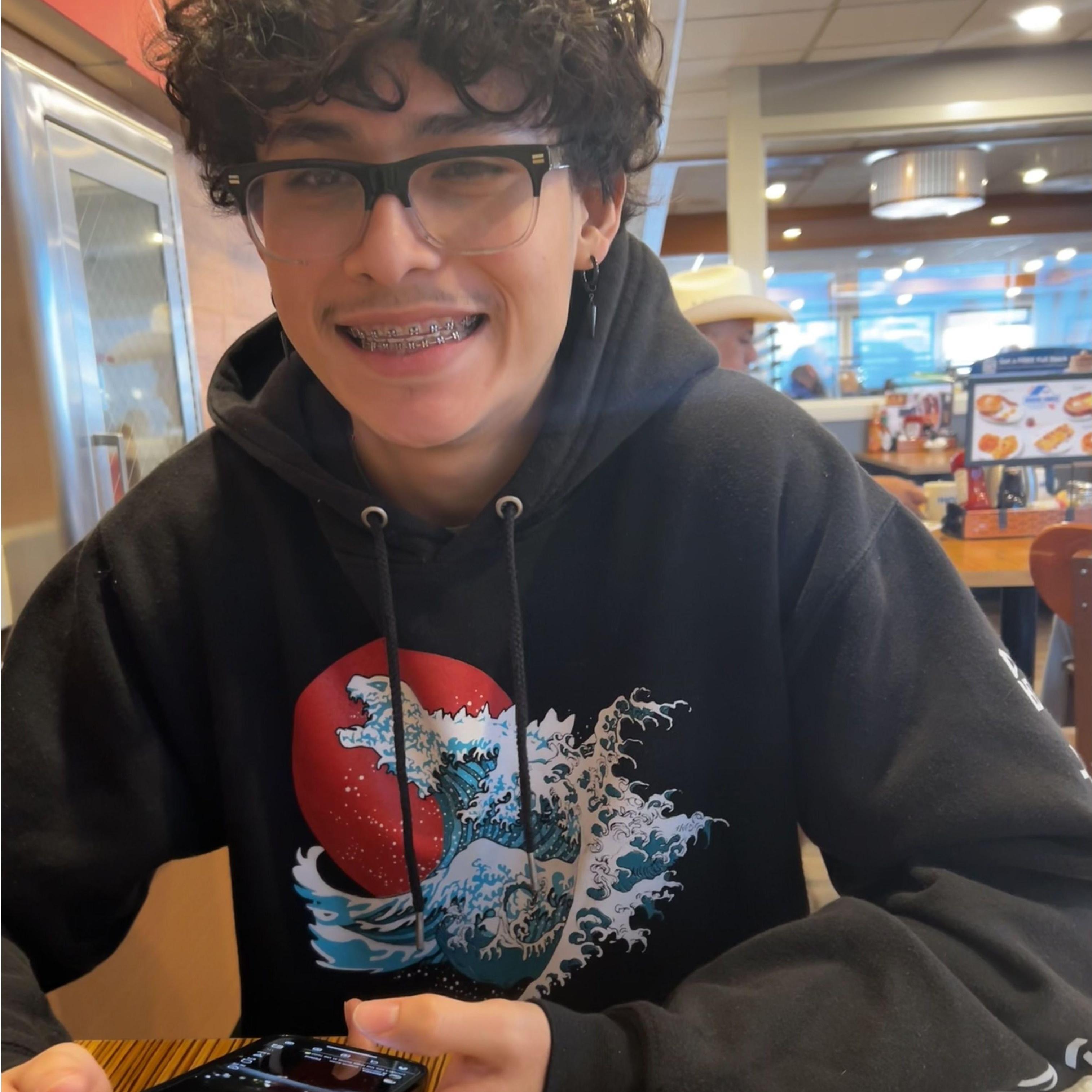 This was our 3rd Christmas Eve together a few days before we went to a musical about Jesus and went to ihop for breakfast. One out of many goofy photos of him