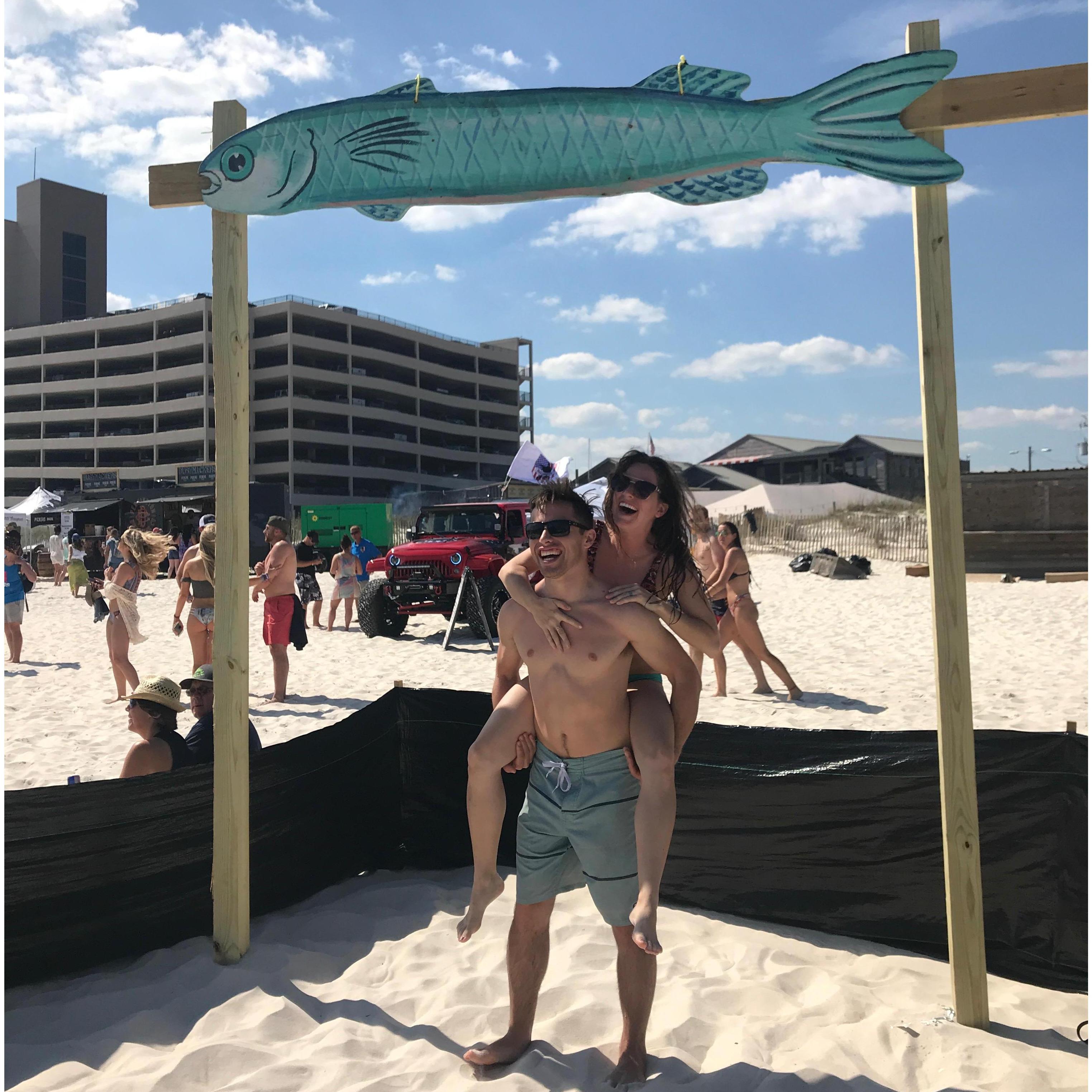This lovely event is titled the Mullet Toss, where you toss a dead fish over the Alabama-Florida Border