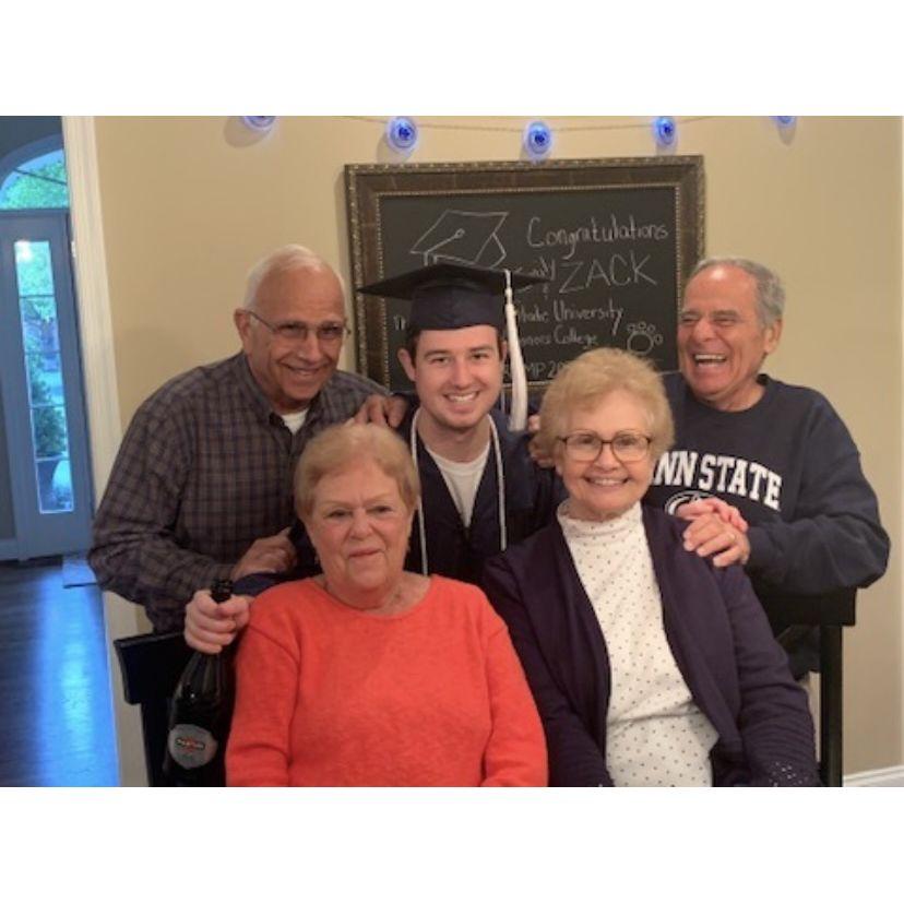 Zack with his grandparents celebrating his graduation from Penn State.