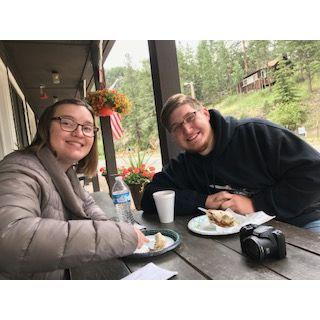 Enjoying a cinnamon roll at The General Store in Glen Haven, CO