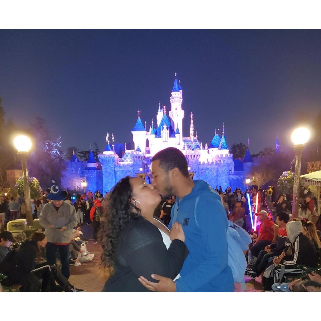 Kissing my prince at our first trip to Disneyland!