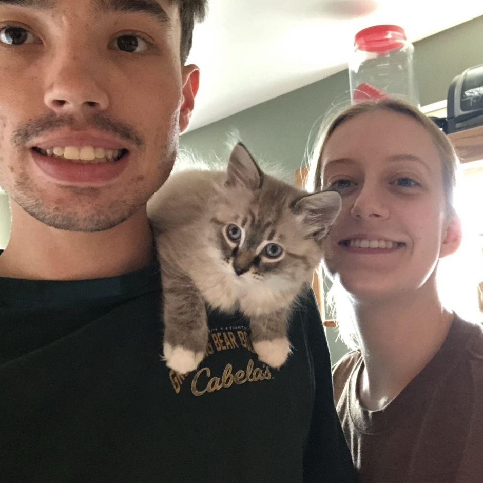 Shamus and I right after we adopted Daisy! She used to love to sit on his shoulder (June 2021)