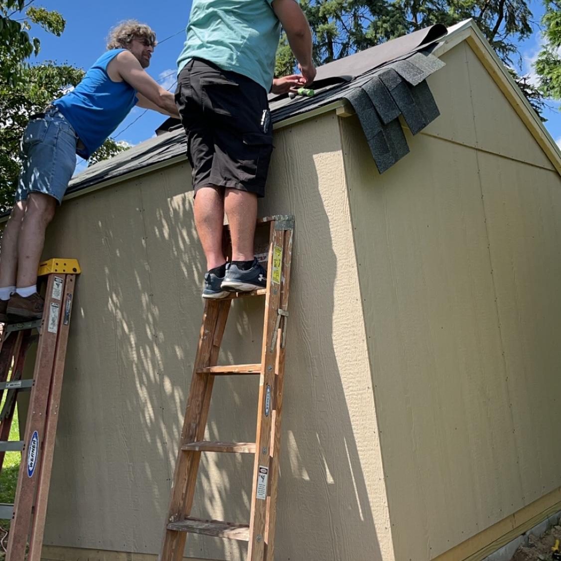 Building a garden shed together (with some help from Emily’s dad).
