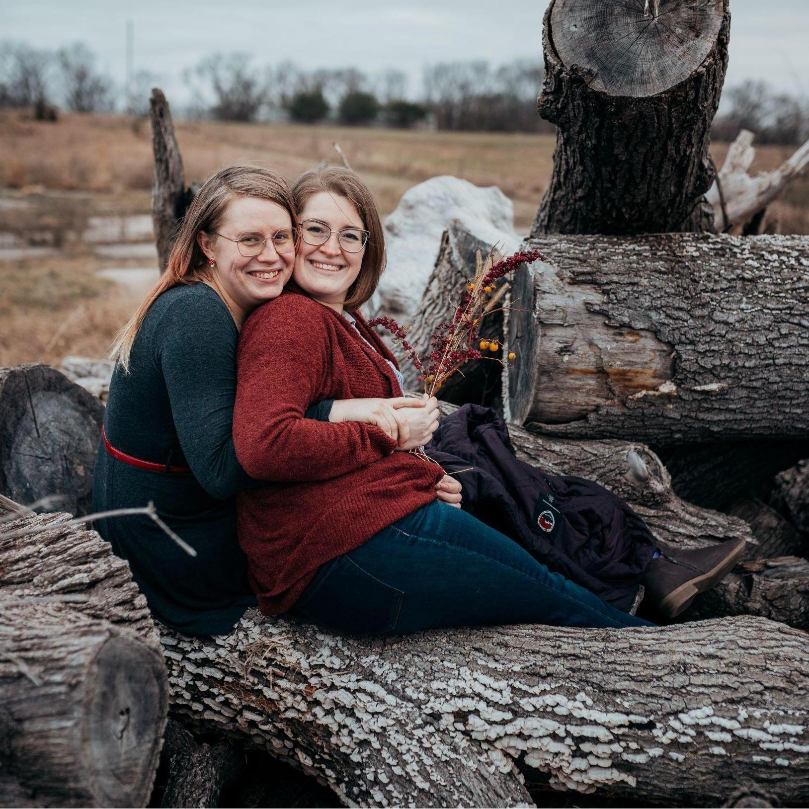 Found a giant pile of cut trees, we just HAD to climb it