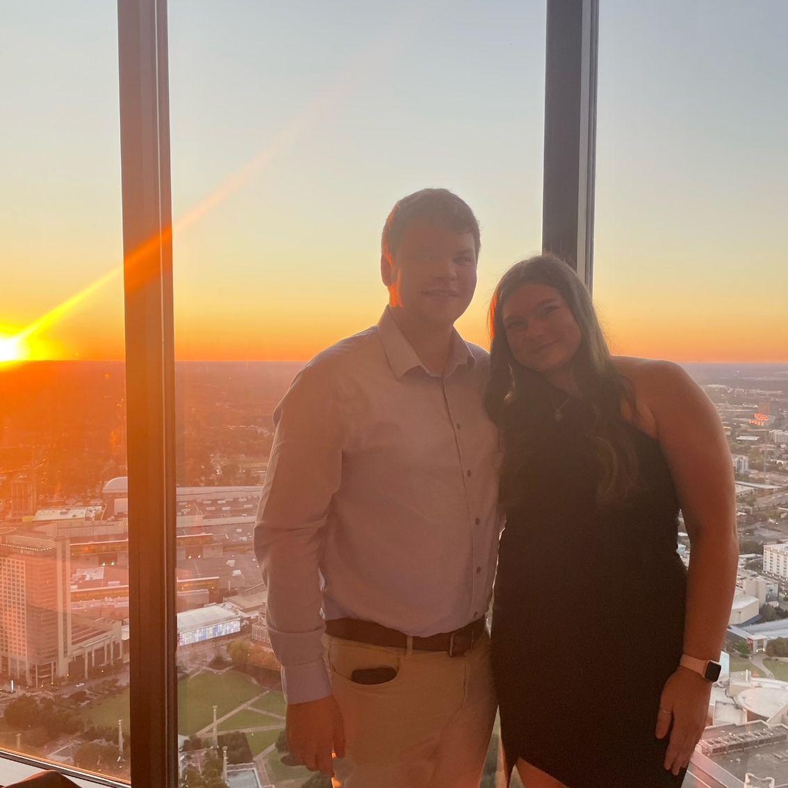 October 2022: Our first dinner at the Sun Dial together. Little did we know this is where we'd get engaged!