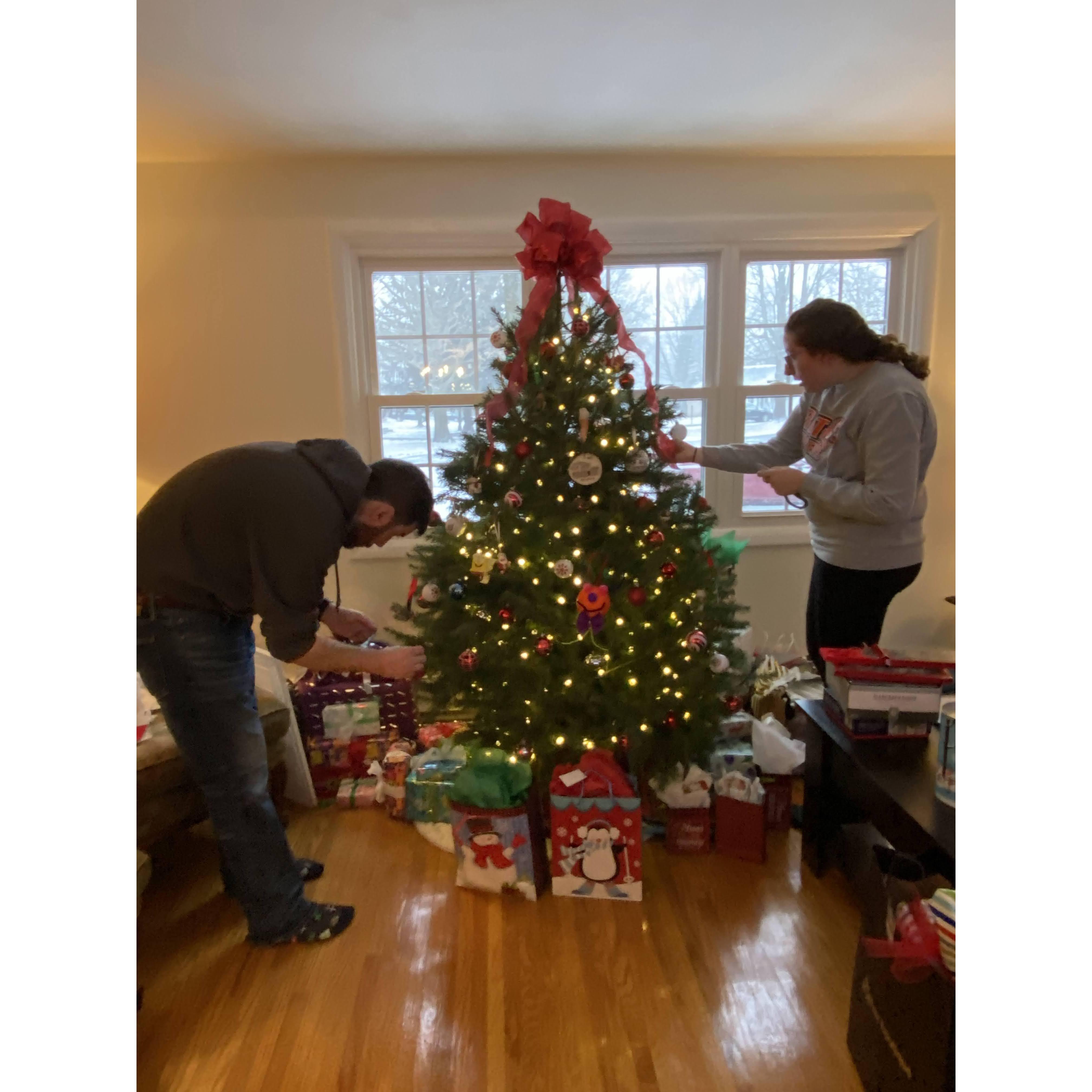 December 2022-Decking the tree out with ornaments from both Clay and Zoe's childhoods