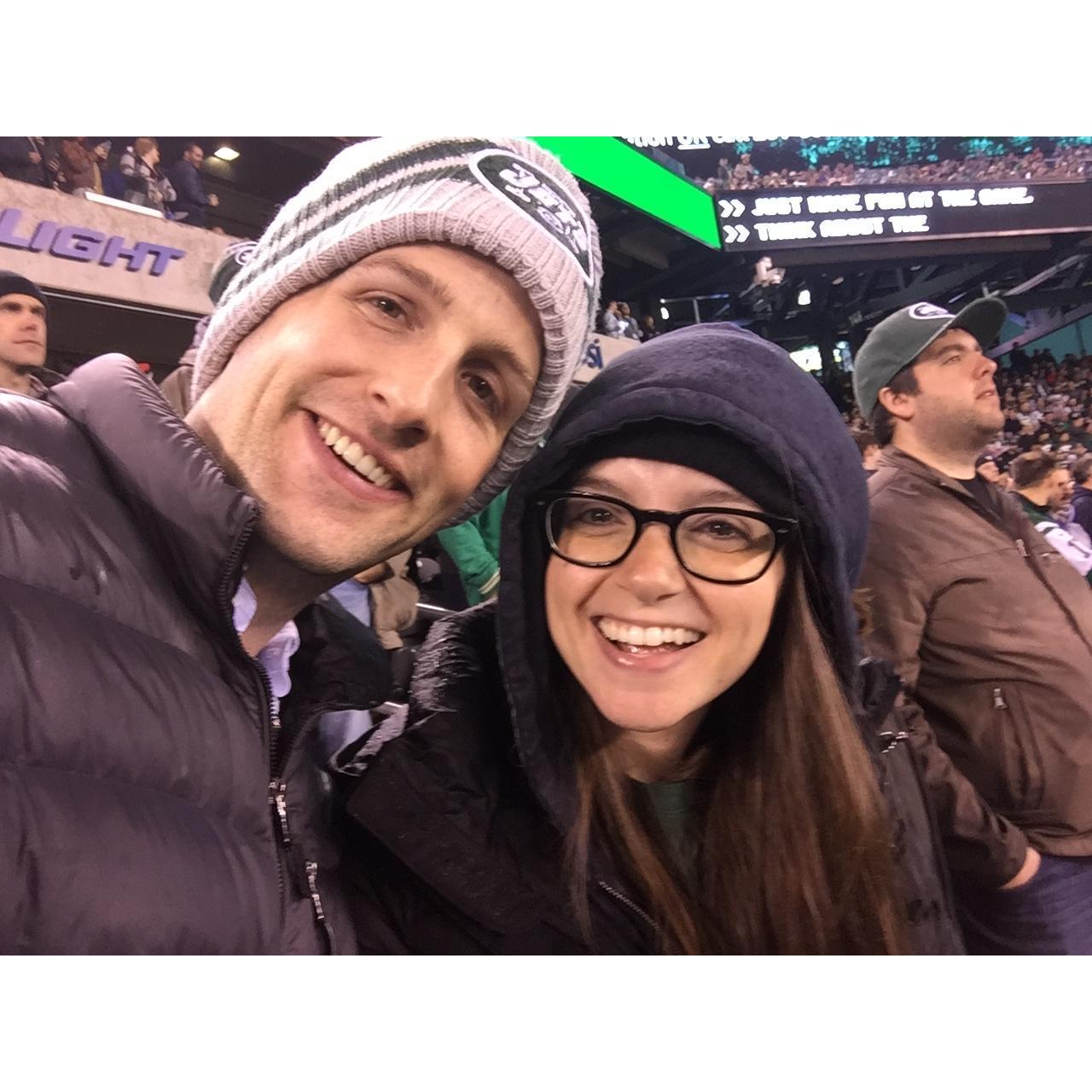 Pretending to be models at a Jets game. Go Giants.