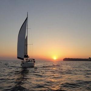 Sunset Sailing at the Caldera in Santorini Greece