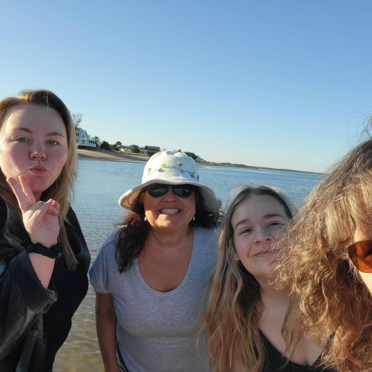 Group photo of Maid of Honor Megan (left) Diana (next to Megan) Rachael (Bride) and Mother in Law Kim (right)