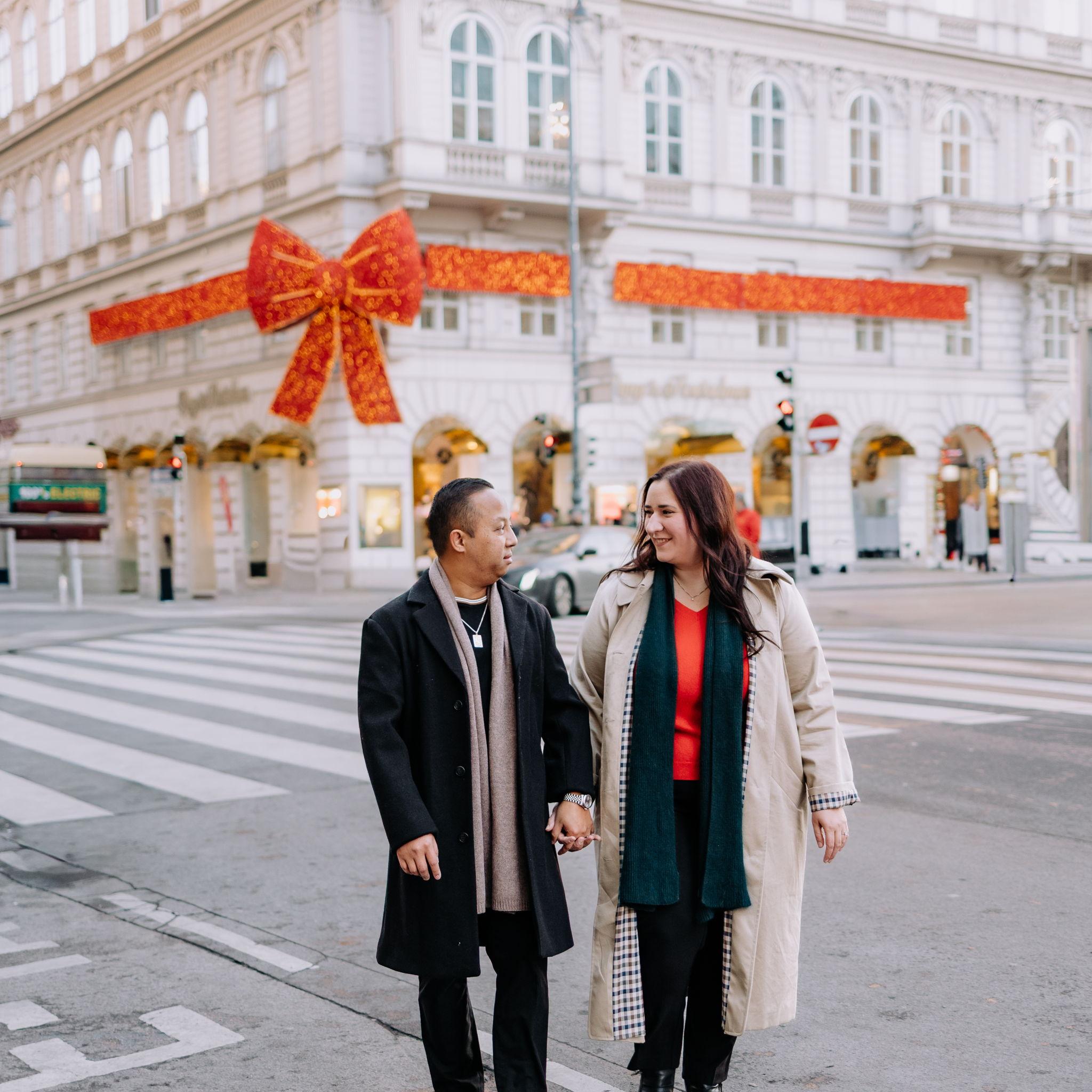 At the famous red bow in Vienna, Austria - another rare moment where it looks like it's just us, but this is probably the busiest intersection in all of Vienna - November, 2025