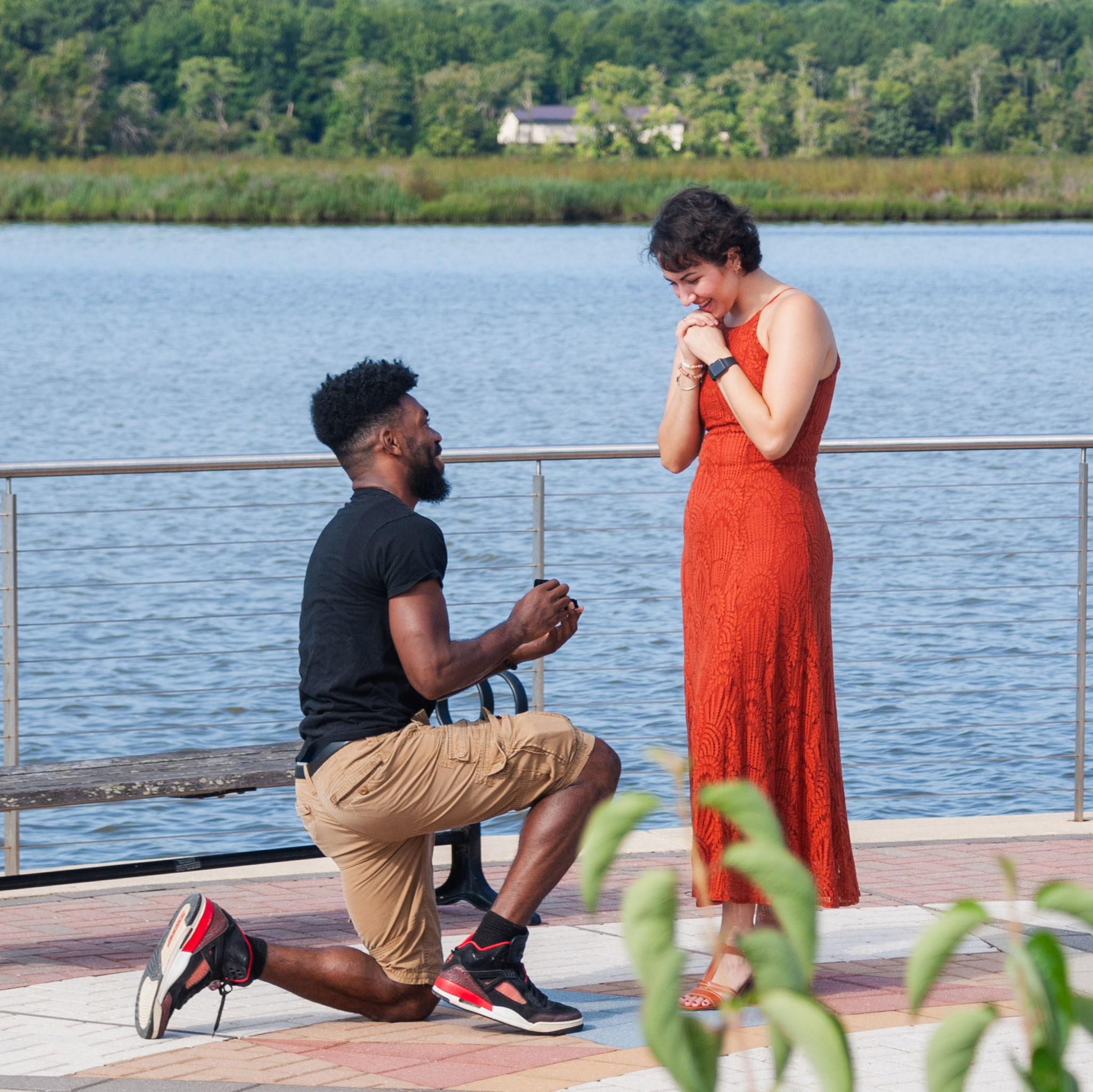 The day we got engaged! At the Leonardtown Wharf on August 24, 2025, Louis got down on one knee and asked Alexa: "Will you do me the honor of marrying me and being my wife?" We both smiled all day.
Shout-out to Louis's best man Jared, who hid in the bushes to get the shot!