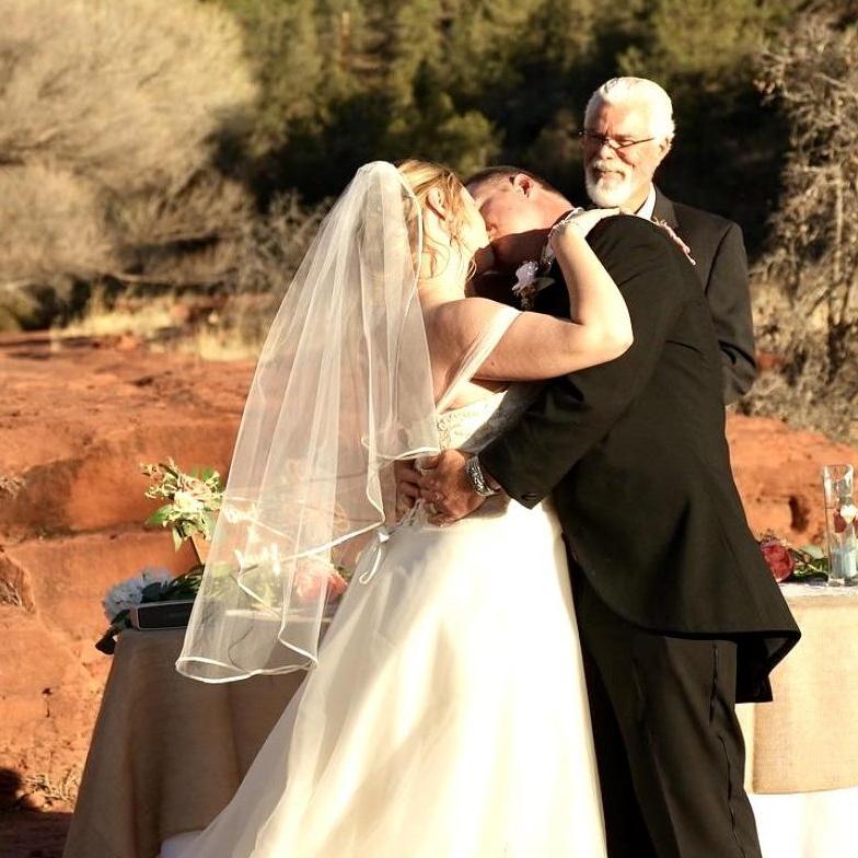First kiss as Mrs. & Mrs. Mitchell😘