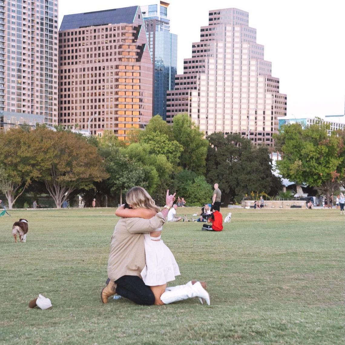 It took Taylor a couple of minutes to figure out what was going on, because let's just say there were quite a few distractions, but in the end...she said yes!