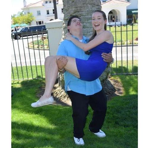We were taking family photos when he tried to pick me up 🤣