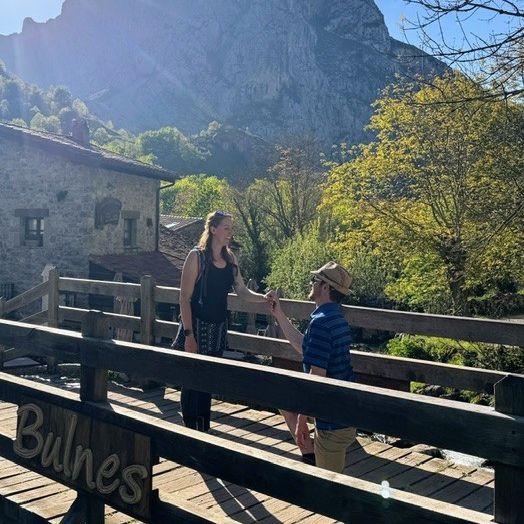 During the historic blackout in Spain, Katie and Ryan hiked to the quiet town of Bulnes. On the quaint town bridge, Ryan popped the question.