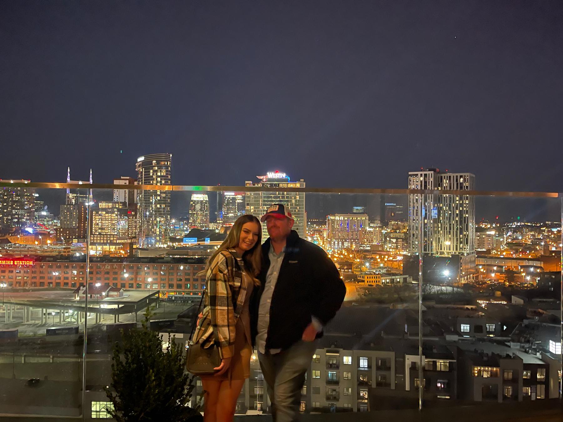 On one of our favorite rooftops at the W Hotel. The view never gets old.
