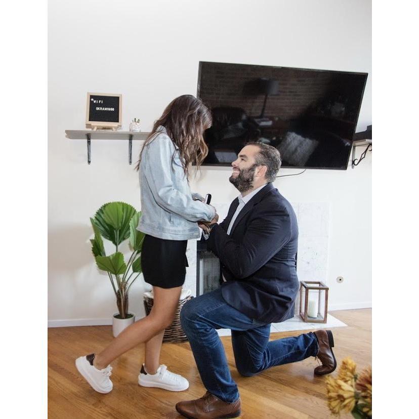 The moment we got engaged. We were in our living room in River North.