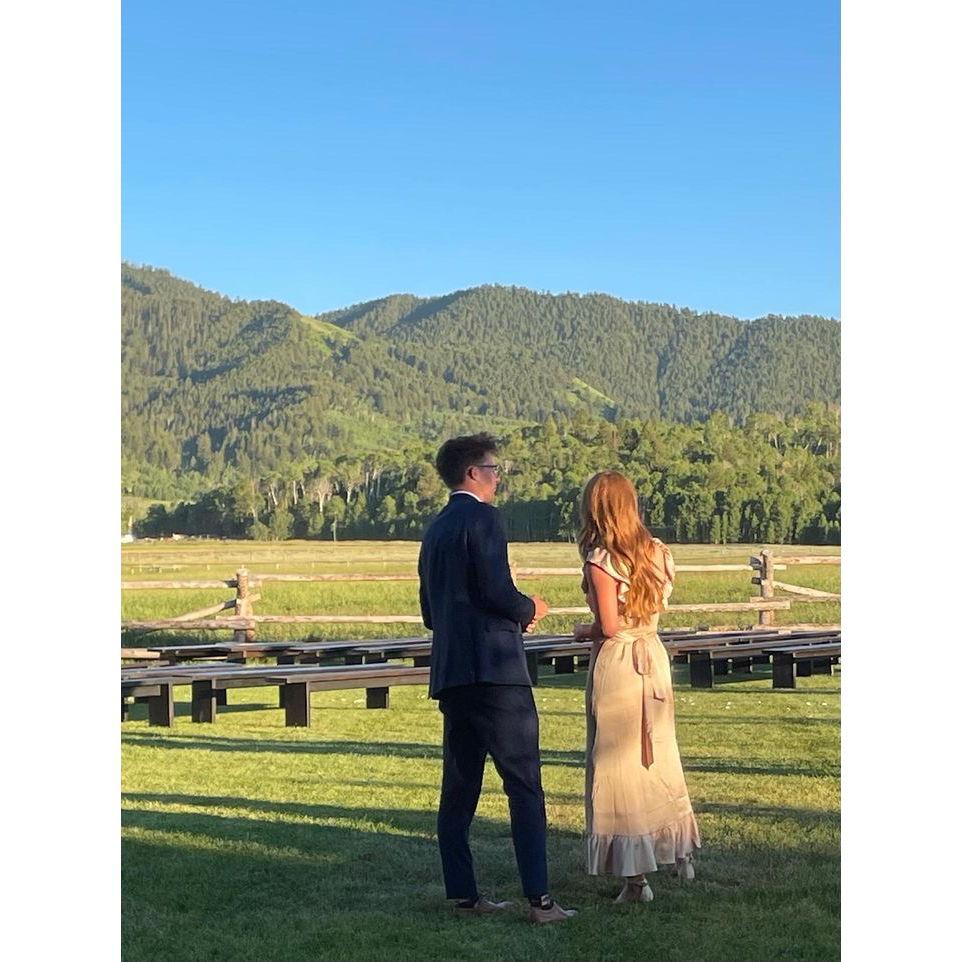 The meet cue! Taitum was a bridesmaid, Logan an honorary plus-one. They met at a Jackson Hole wedding. Taitum may have ghosted him after… but the universe clearly had other plans.