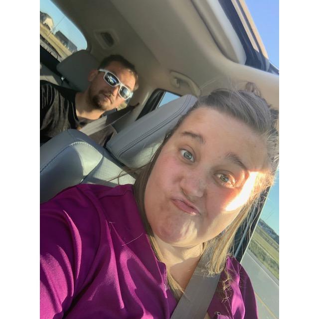 Tylor is always doing something funny... This time he insisted on sitting in the back seat to be chaperoned by Kerstyn.