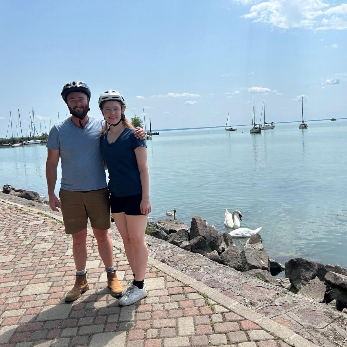Biking around Lake Balaton; swans mate for life.