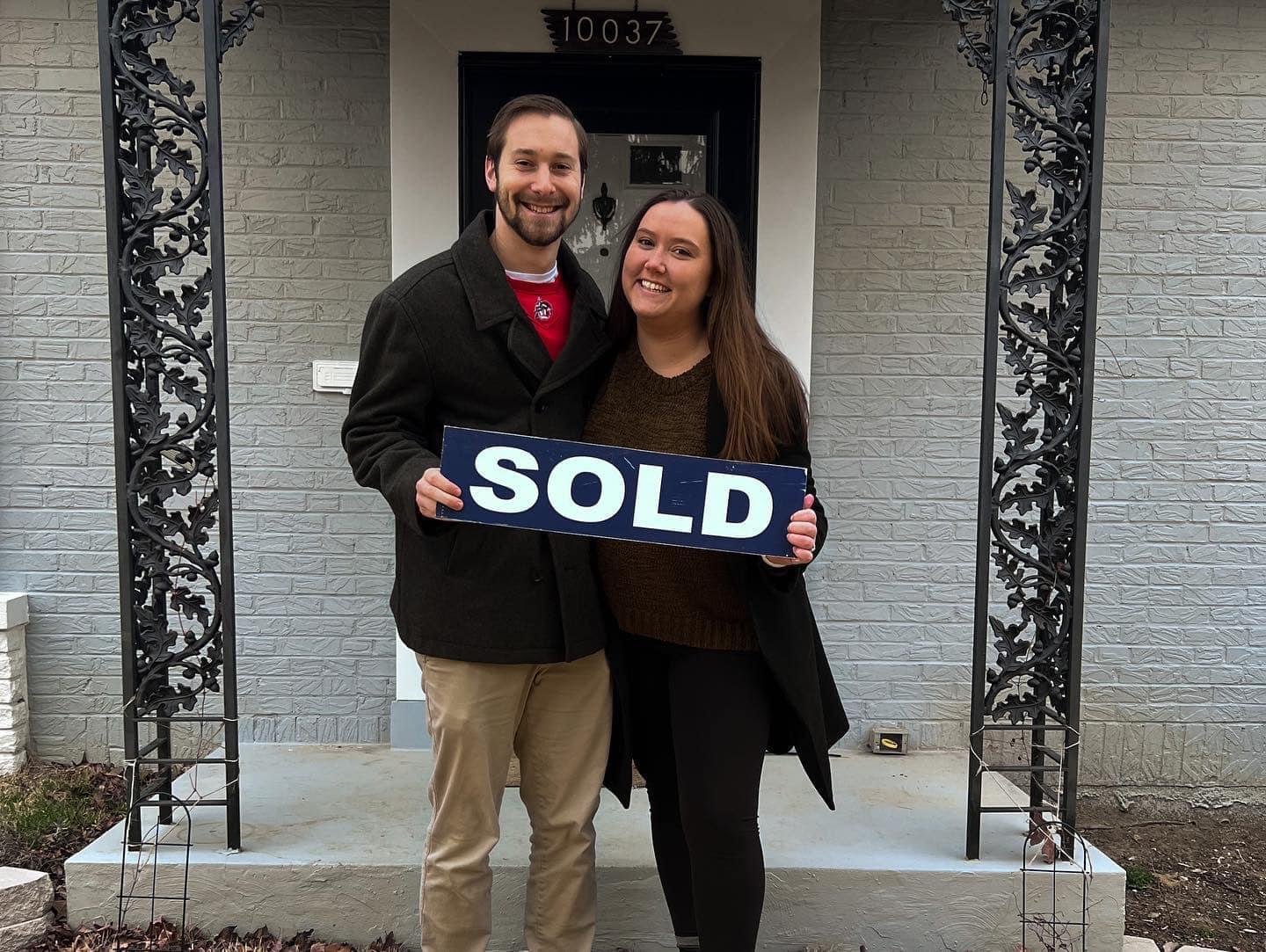 And our most recent photo - when we closed on our house!