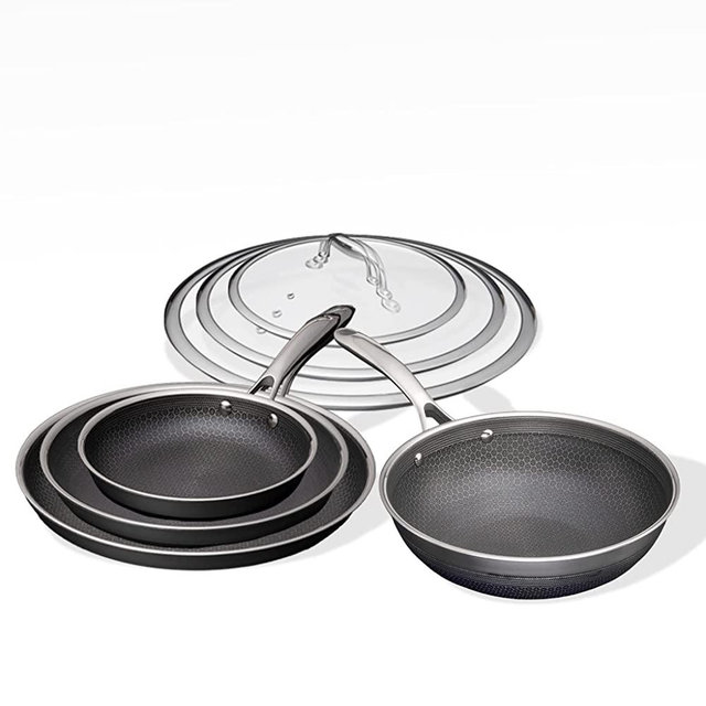 HexClad 7 Piece Hybrid Stainless Steel Cookware Set - 6 Pc Pan Set with Lids and 10 Inch Wok, Stay Cool Handle, PFOA Free, Dishwasher and Oven Safe, Non-Stick