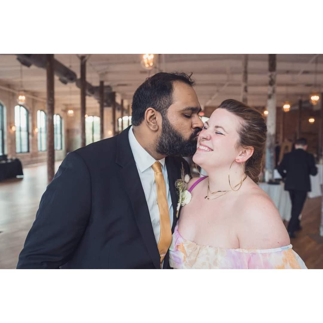 Big smooch at Jordan and Mary's wedding, 2023