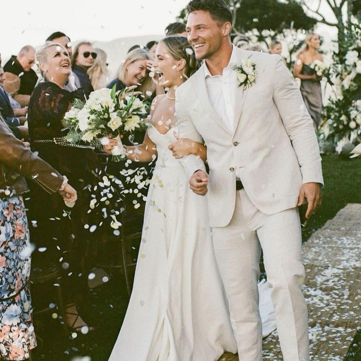 Mariana and Zach will both be wearing white/ivory
