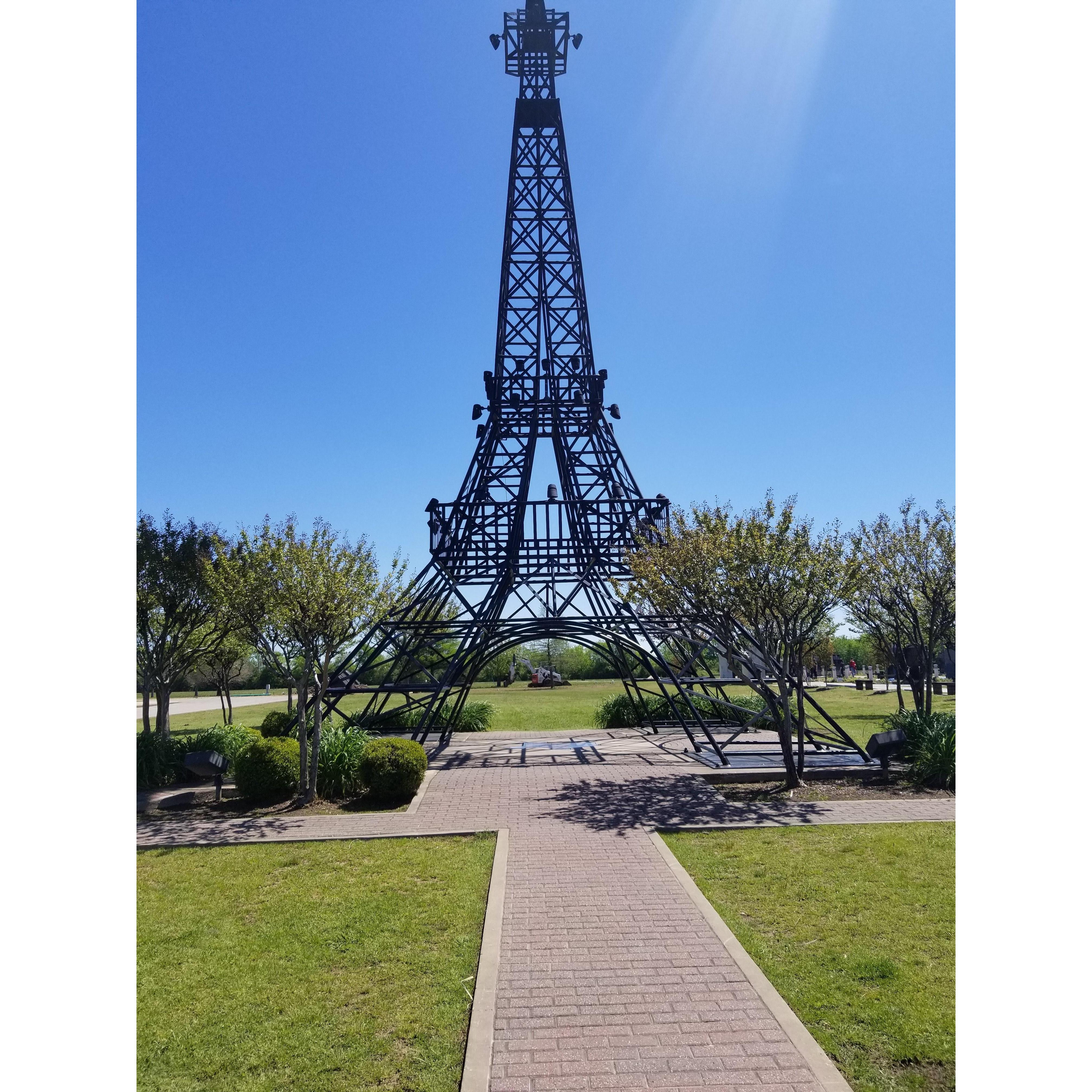When he took me to Paris. 


Paris, Texas with an Eiffel tower with a red cowboy hat on it.