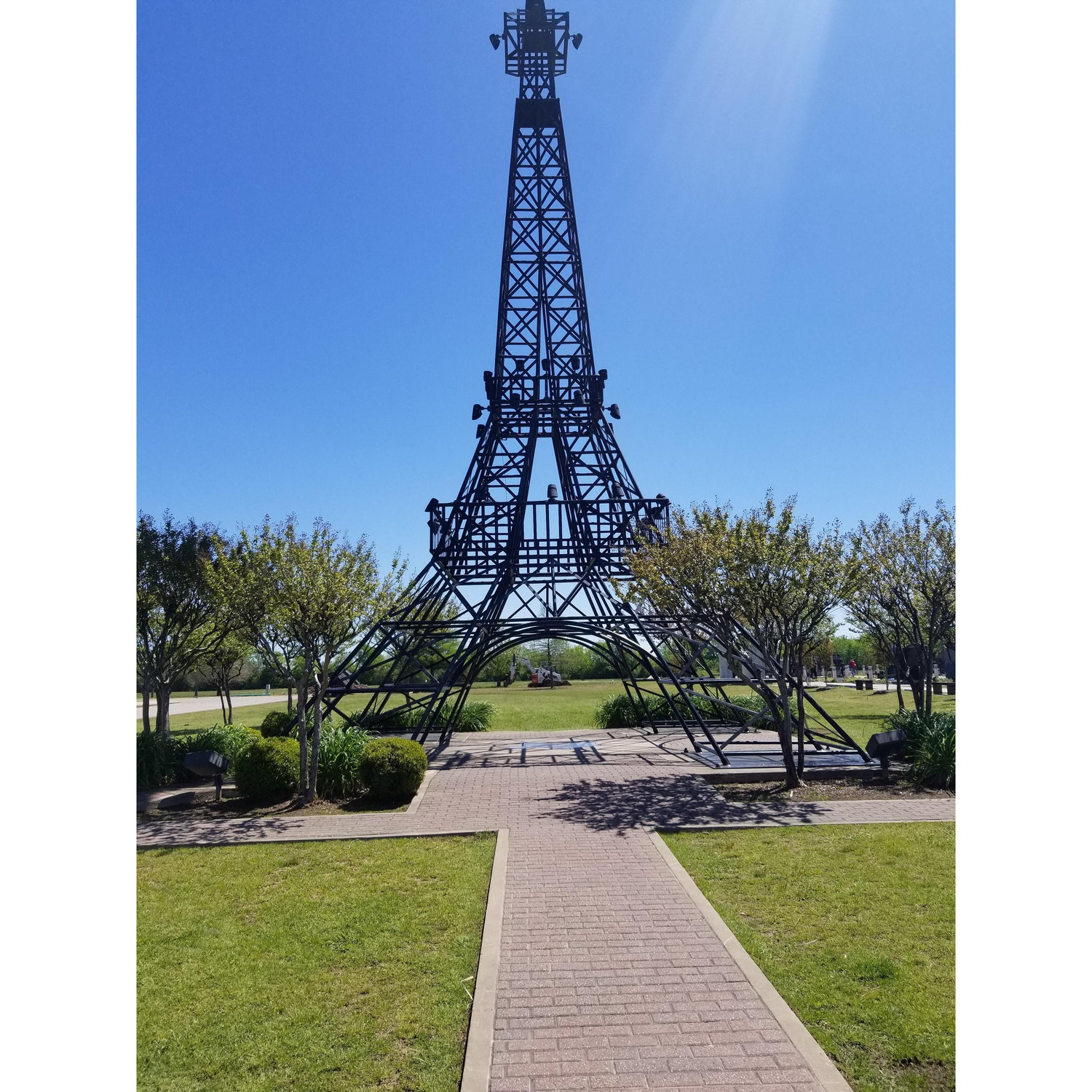 When he took me to Paris. 


Paris, Texas with an Eiffel tower with a red cowboy hat on it.