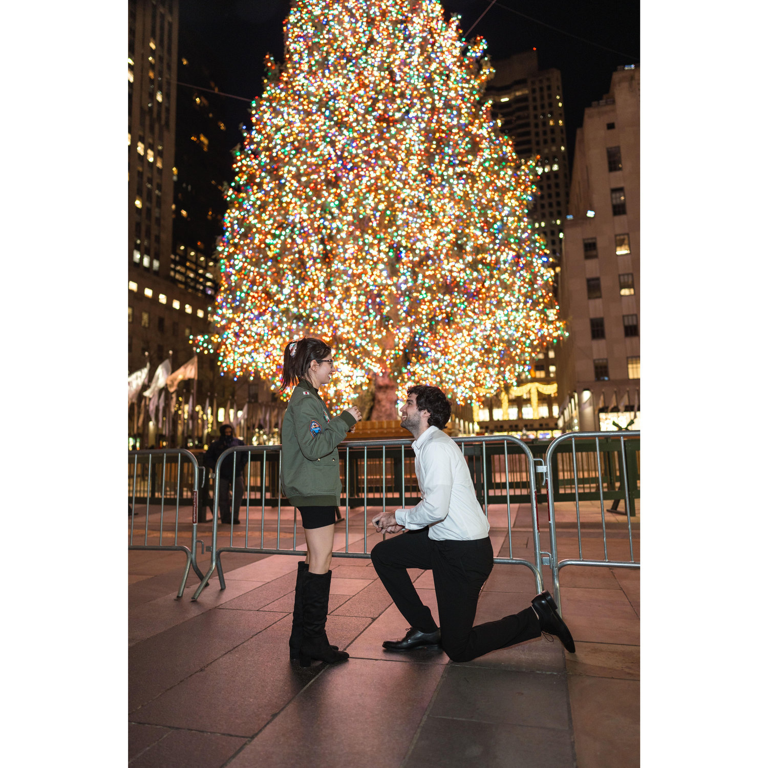 Dustin popping the question in front of the Rockefeller tree!