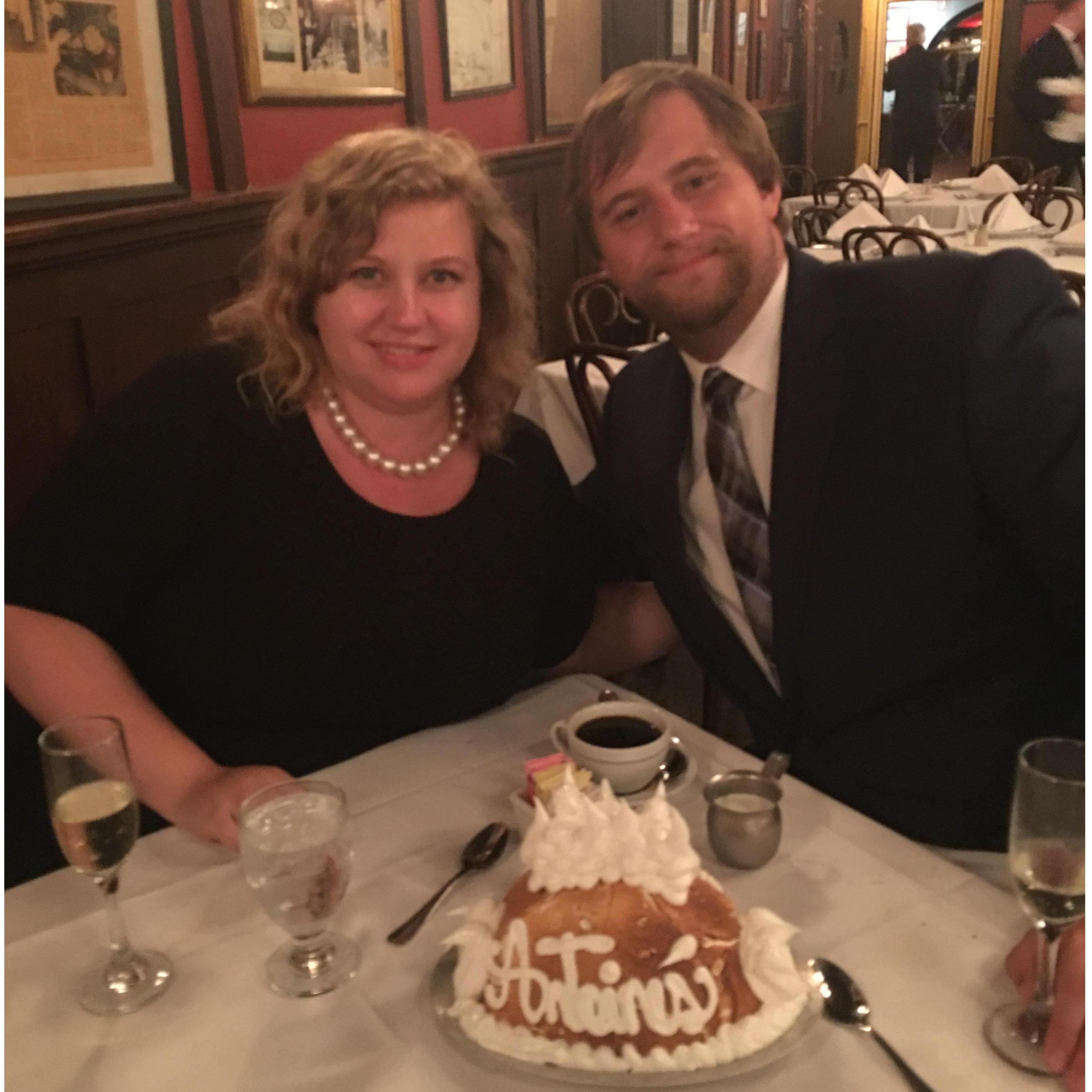 Celebrating our engagement at the historic Antoine's restaurant in New Orleans, Louisiana