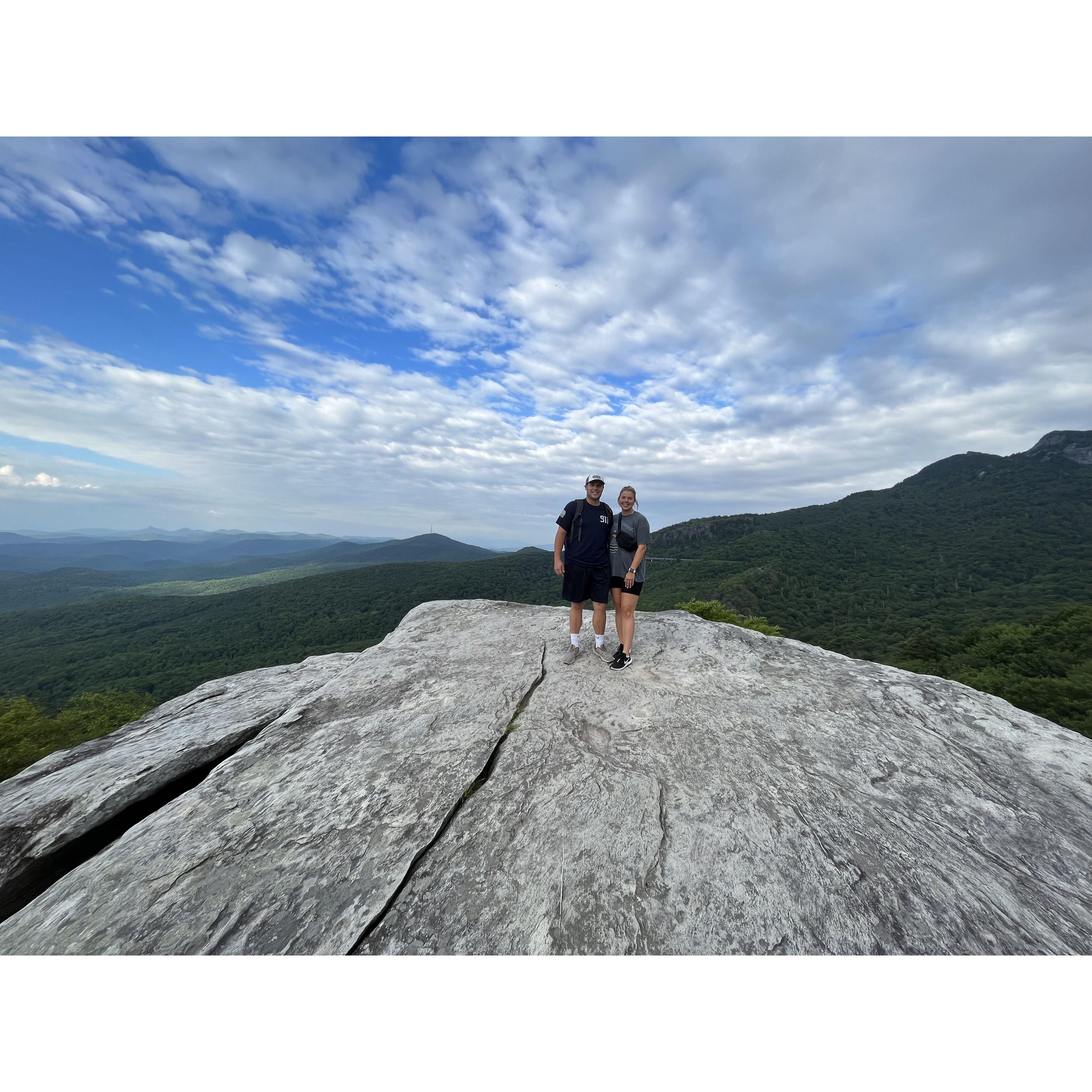 We share a love for hiking and experiencing new views! This was in Linville, North Carolina in 2023.