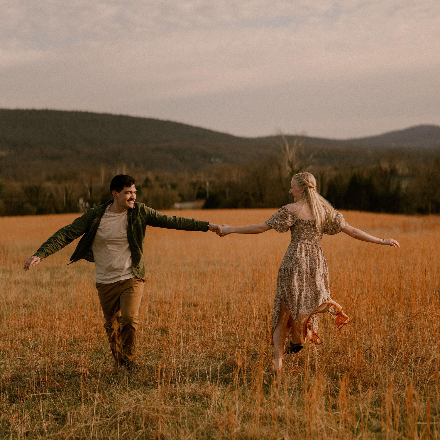 got to frolic in a field for our engagement photos by the amazing Leigh Anne :) (leighannebraderphotography)
