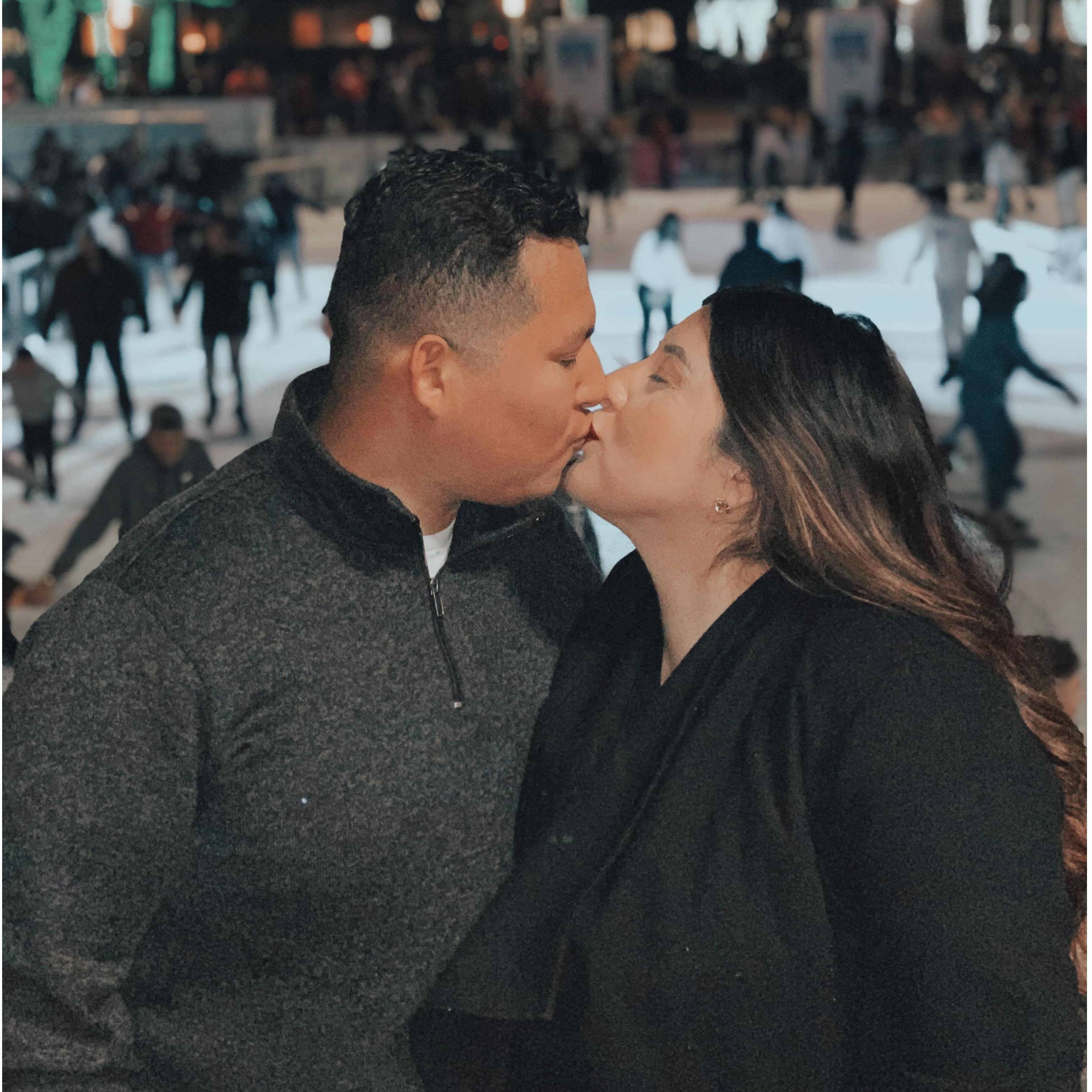 At the skating rink we go to during Christmas in downtown Houston. We get hot chocolate and snuggle up with blankets while enjoying the Christmas caroling.
