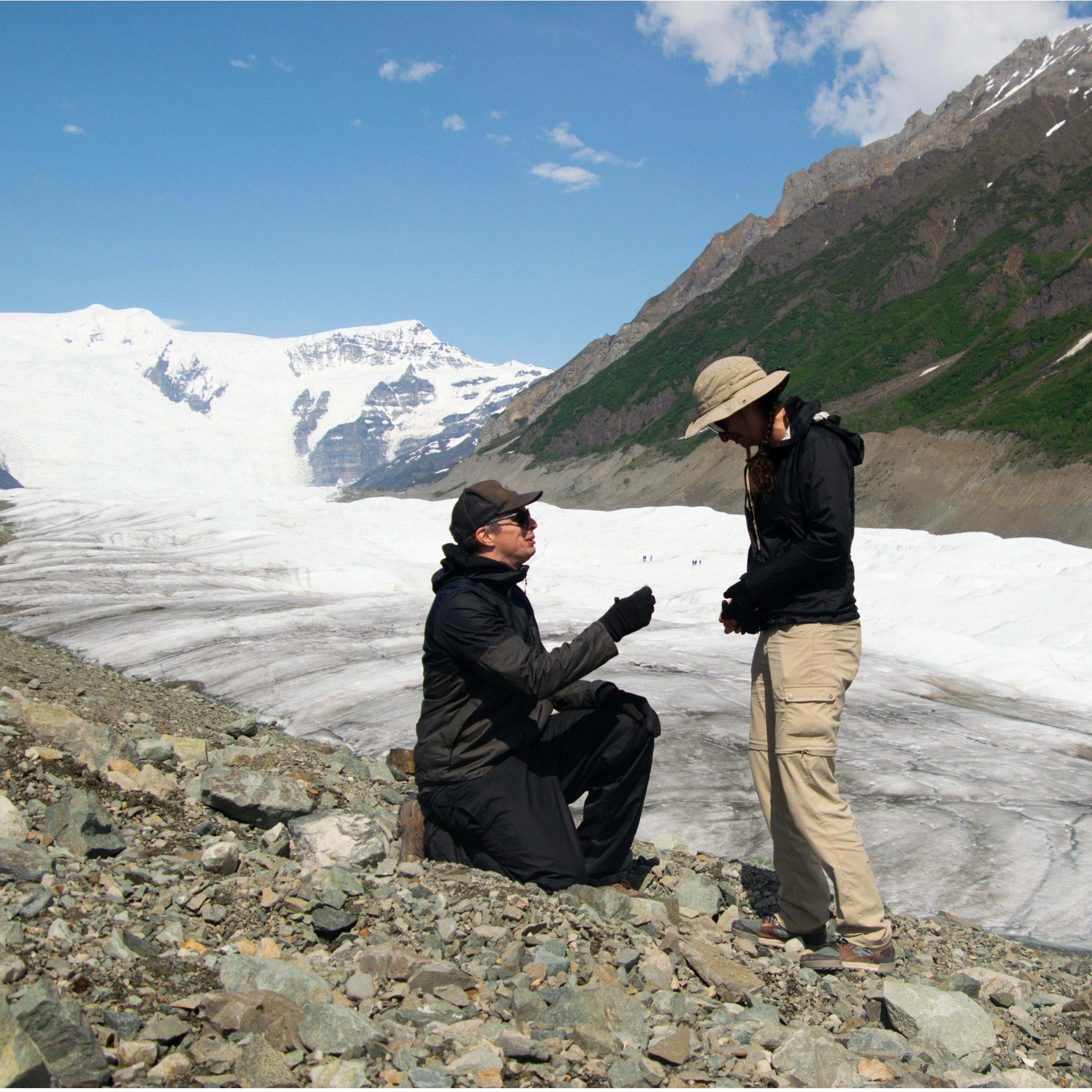 The moment the sun finally popped out and Jesse could propose on the Root Glacier